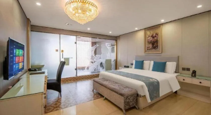 Bed in Aksu Pudong Holiday Hotel