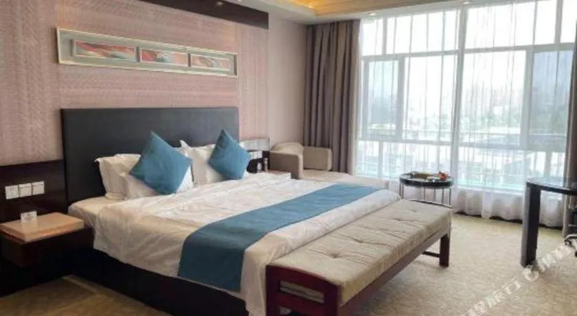 Bed in Aksu Pudong Holiday Hotel