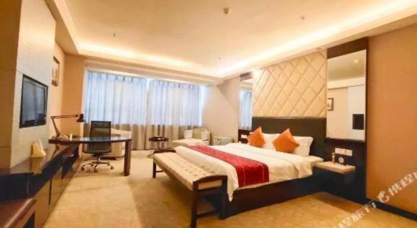 Bed in Aksu Pudong Holiday Hotel