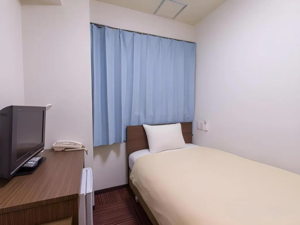 Bed in Ikebukuro Royal Hotel Higashiguchi