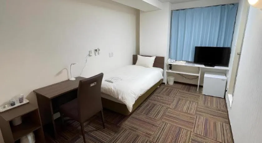 Bed in Ikebukuro Royal Hotel Higashiguchi