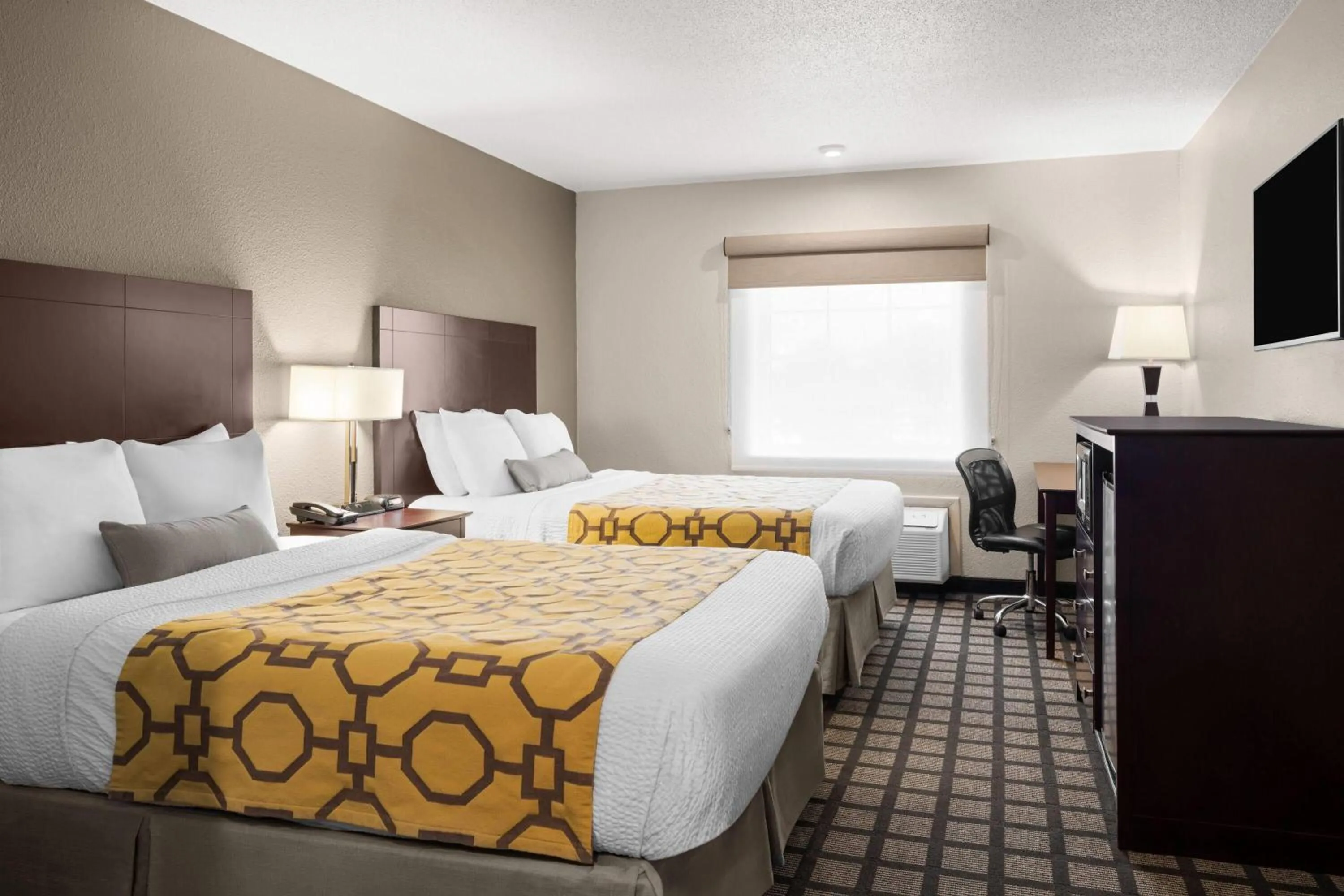 Photo of the whole room, Bed in Baymont by Wyndham Jefferson City