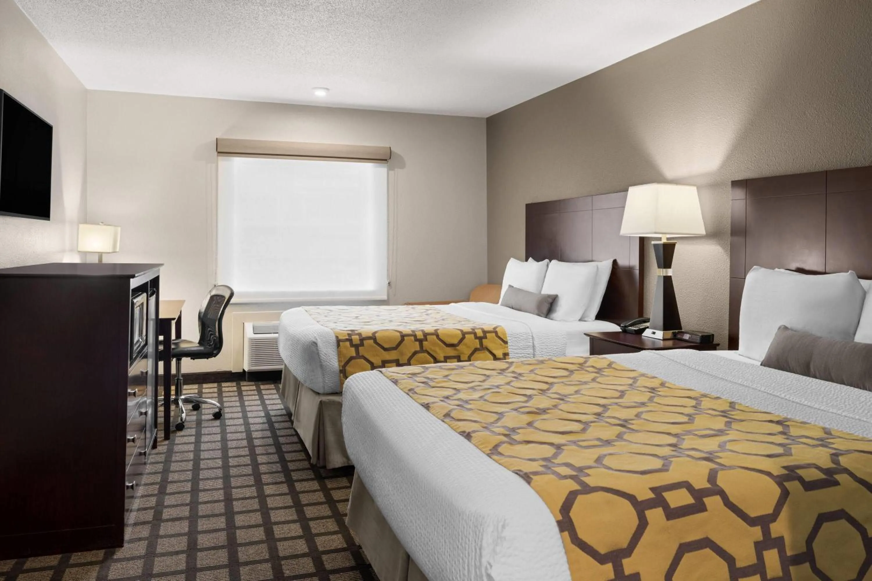 Photo of the whole room, Bed in Baymont by Wyndham Jefferson City