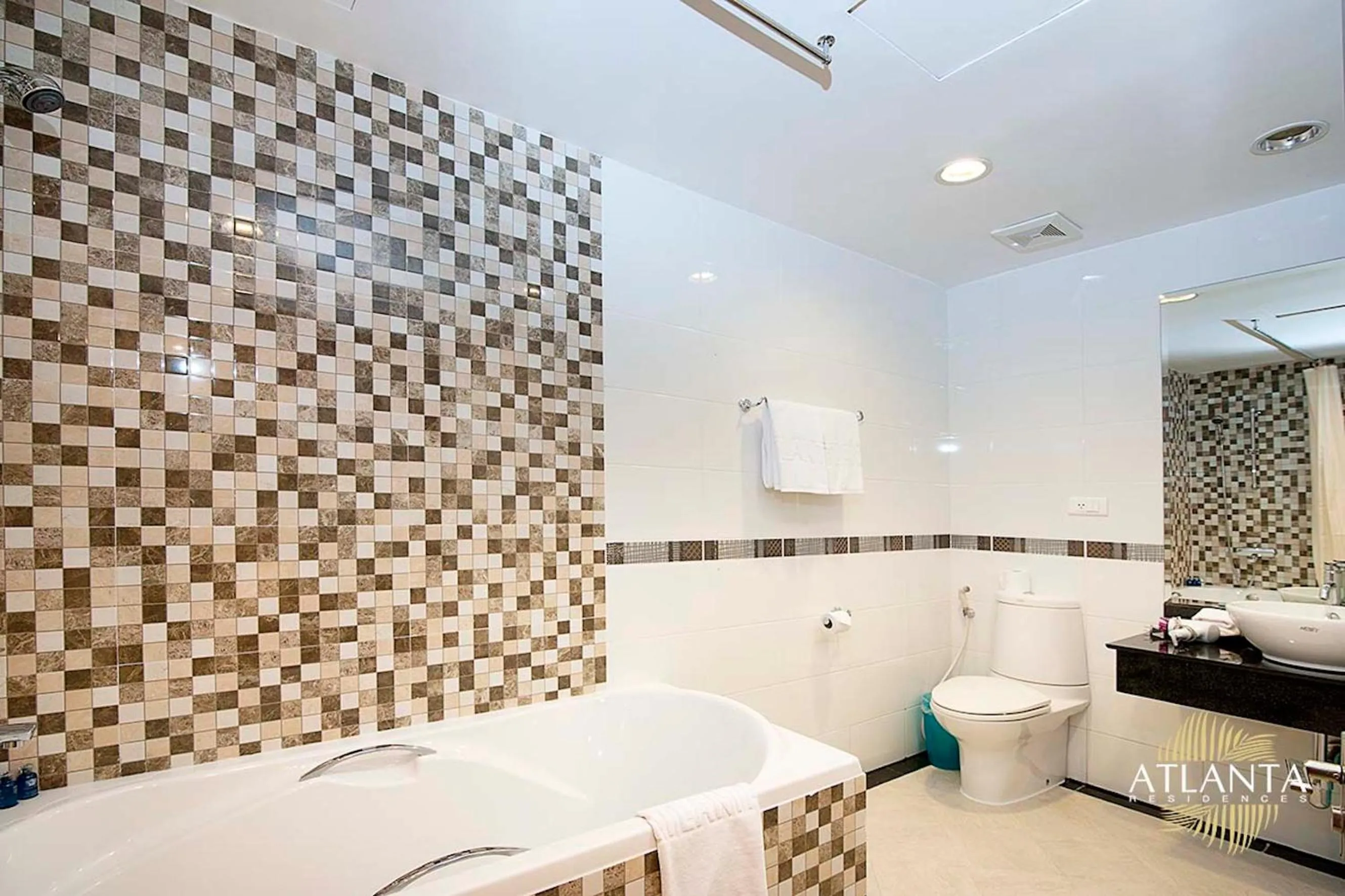 Toilet, Bed in Atlanta Residences