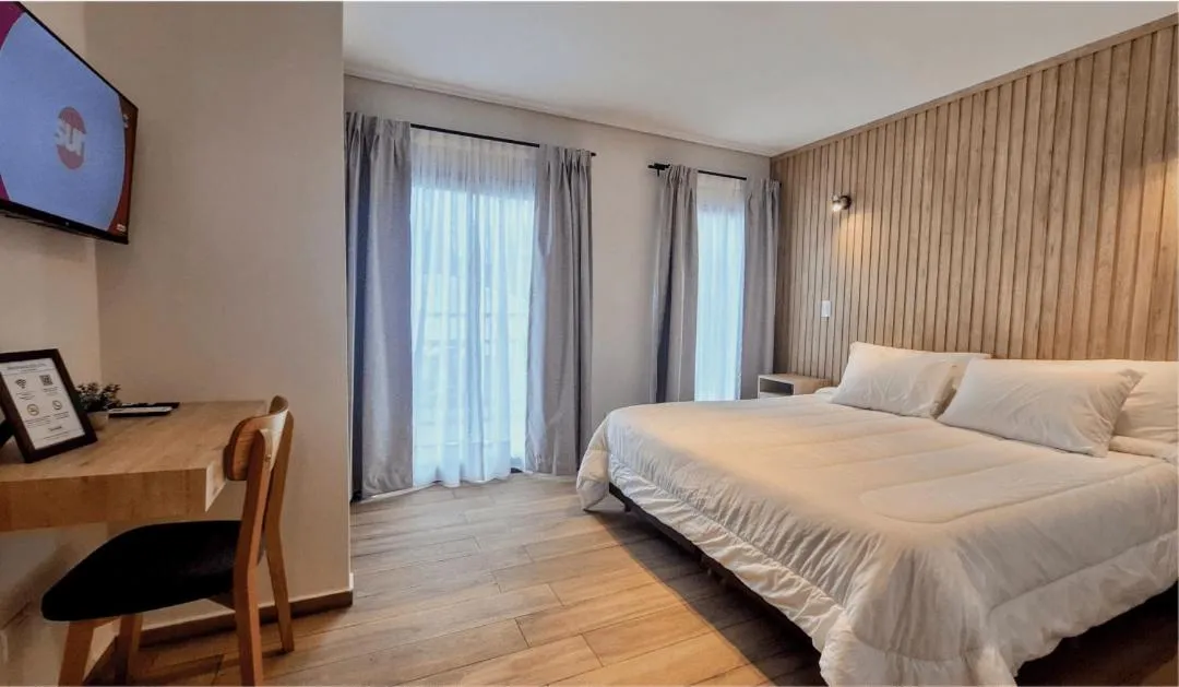 Bed in BlackStone Apart Boutique Hotel