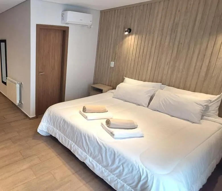 Bed in BlackStone Apart Boutique Hotel