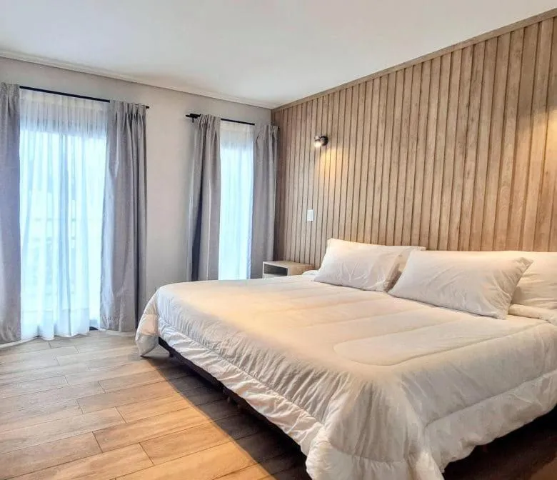 Bed in BlackStone Apart Boutique Hotel