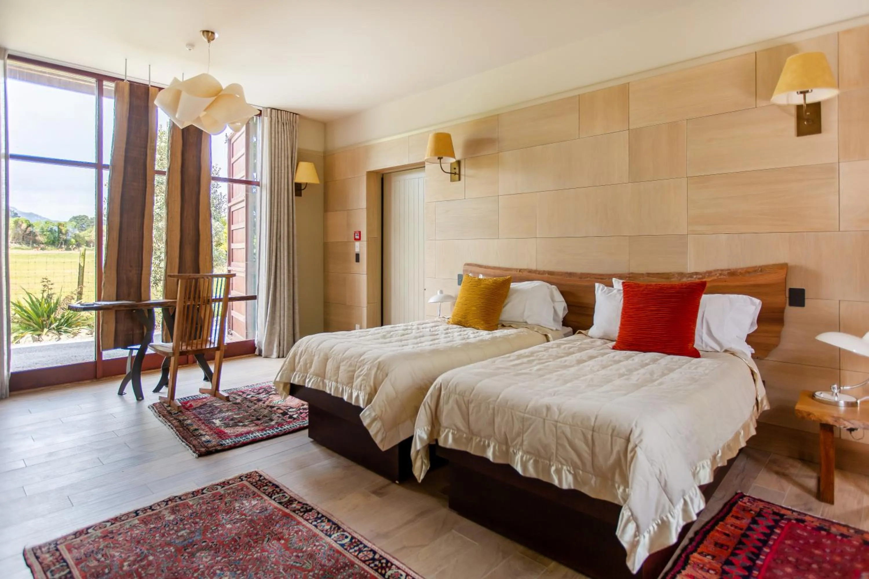 Bed in Hapuku Lodge & Tree Houses