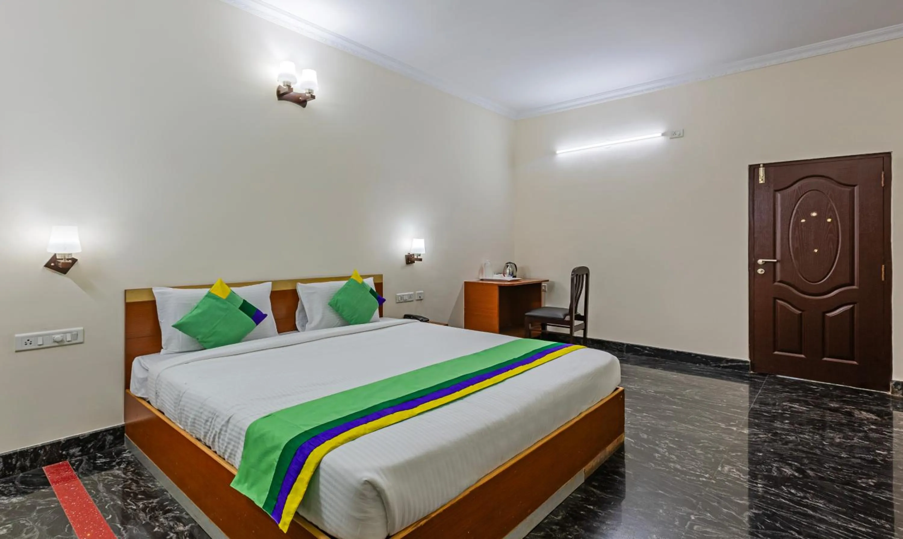 Bed in Treebo Akshaya Residency