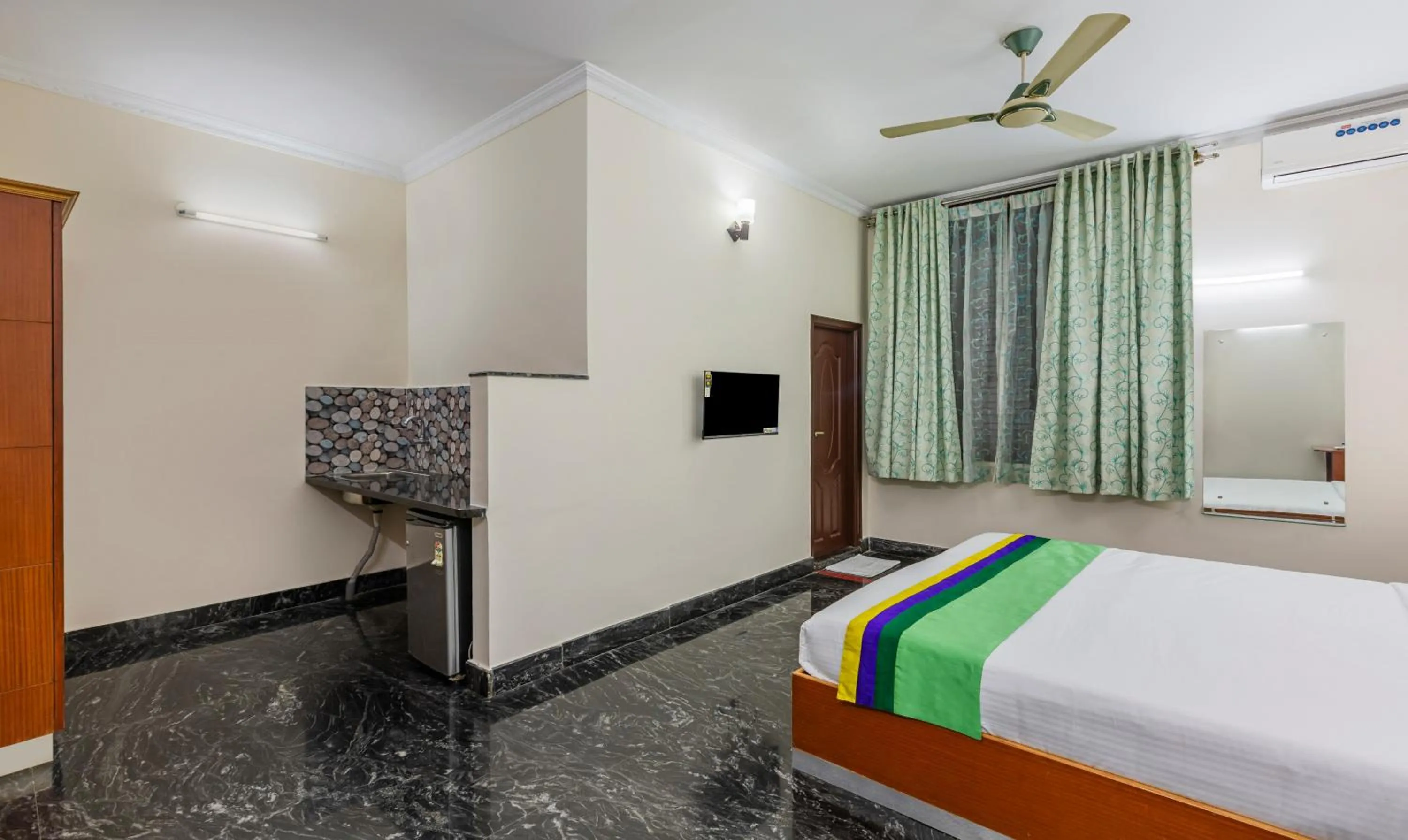 Bed in Treebo Akshaya Residency