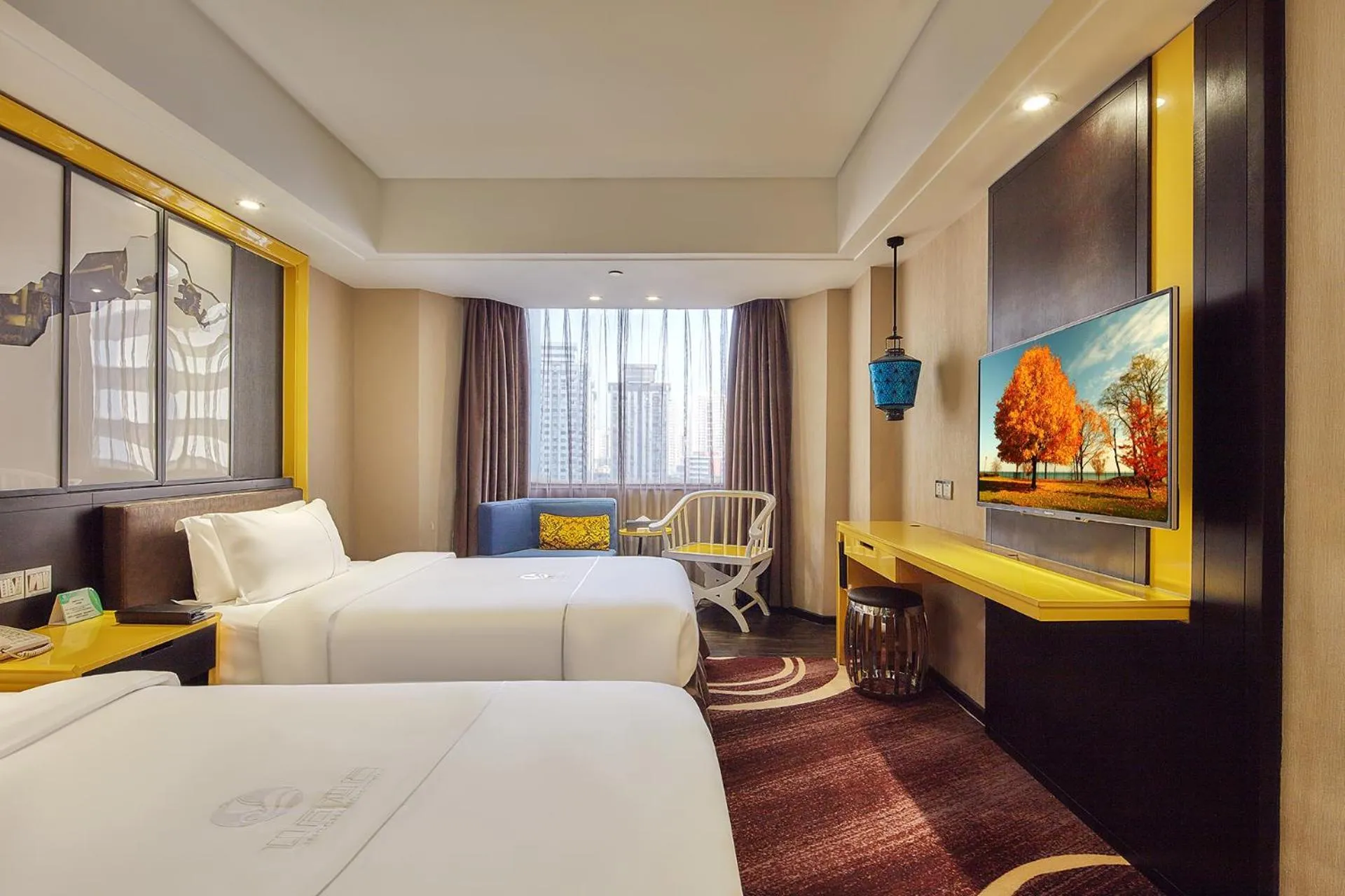Photo of the whole room, Bed in Insail Hotels Huanshi Road Taojin Metro Station Guangzhou