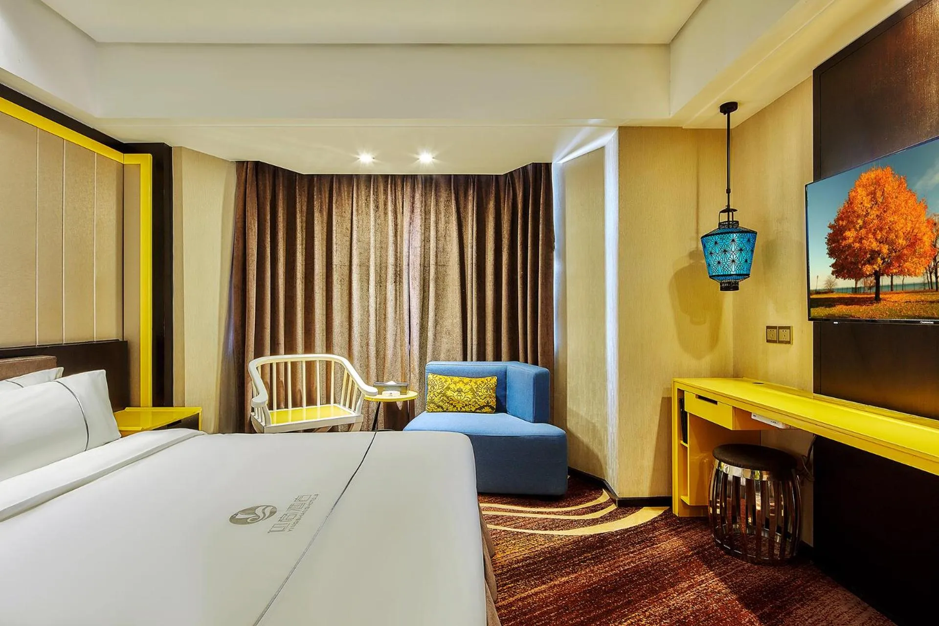 Photo of the whole room, Bed in Insail Hotels Huanshi Road Taojin Metro Station Guangzhou