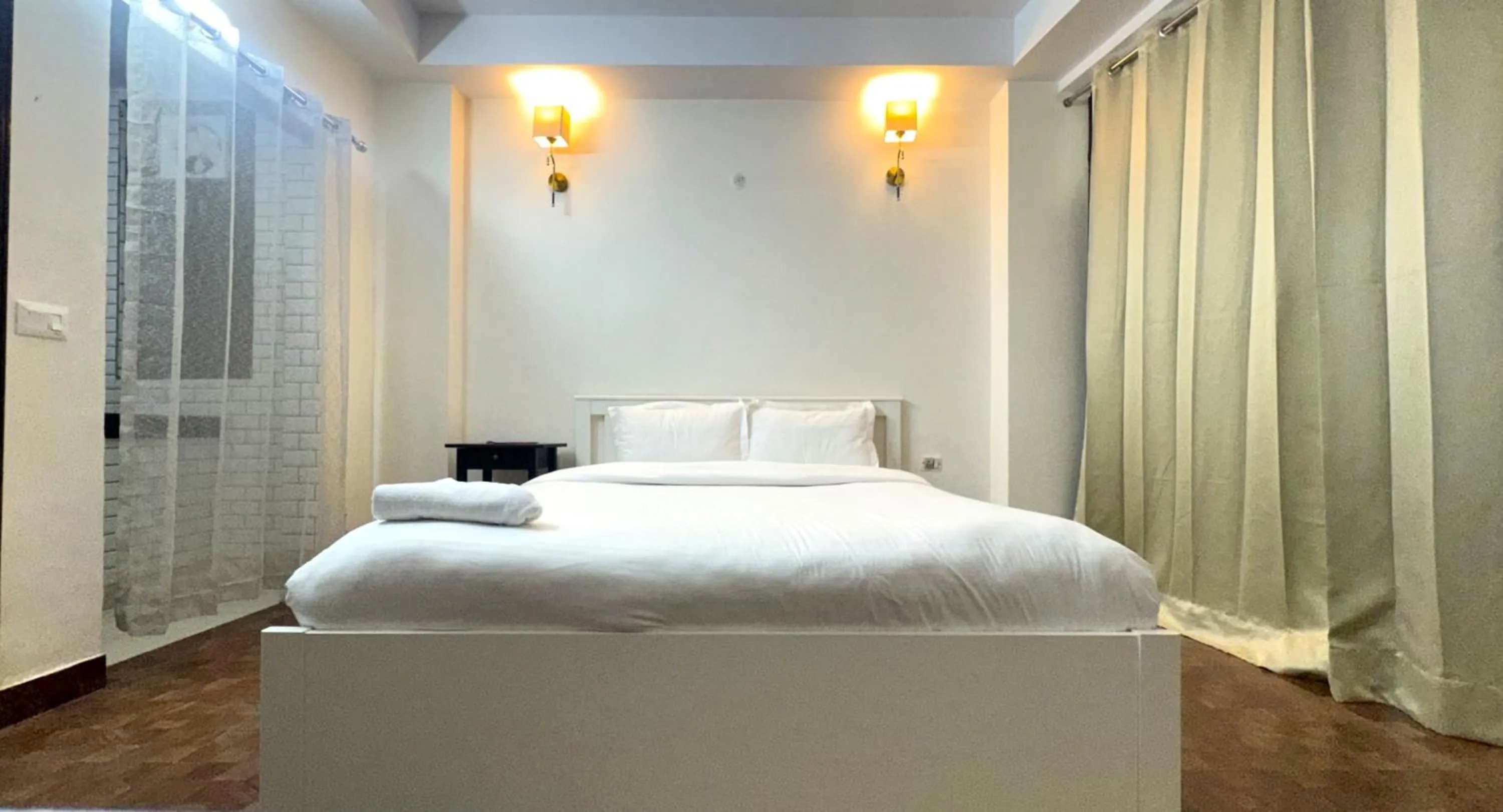 Bed in Hotel Kundan Palace