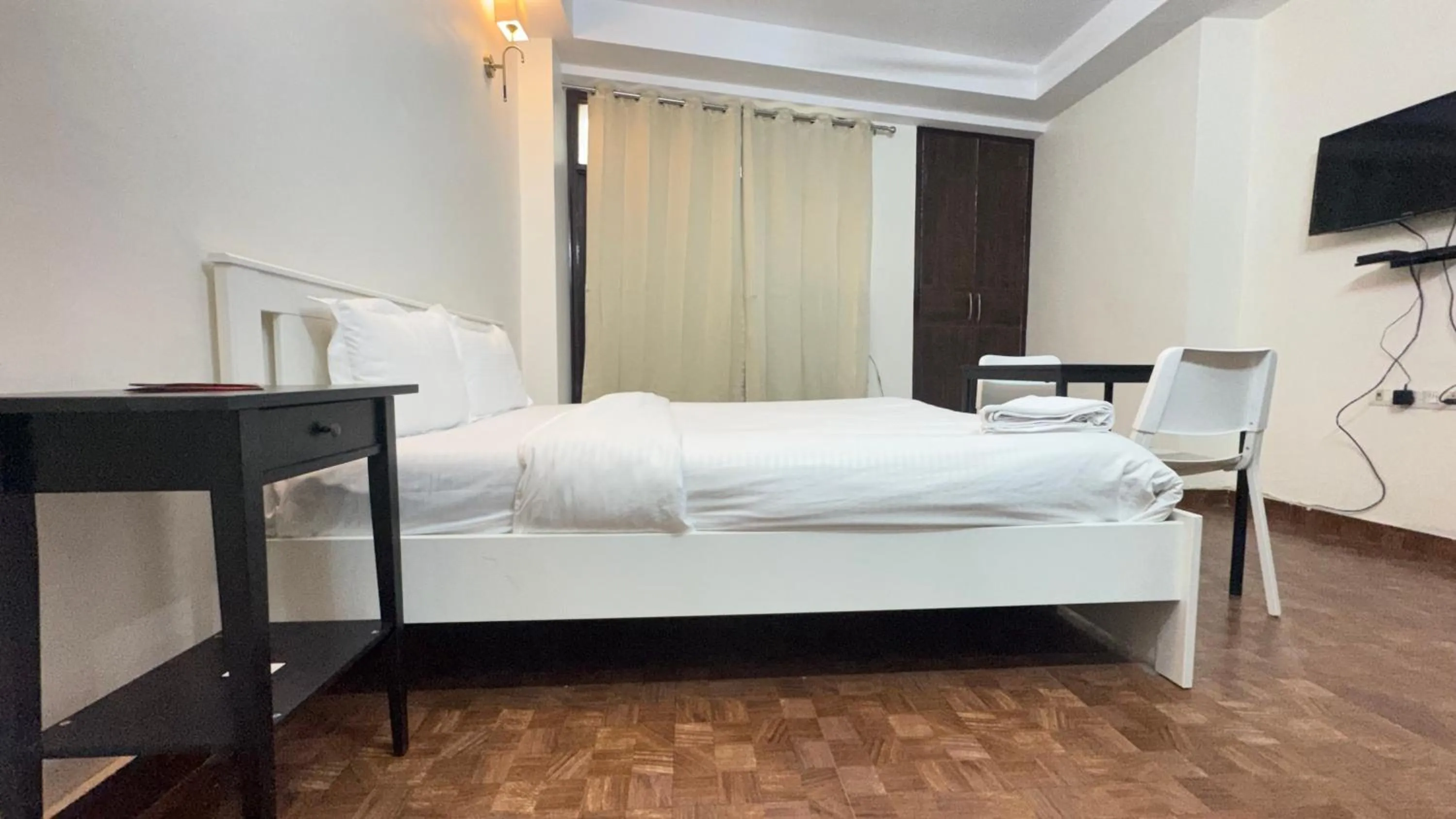 Bed in Hotel Kundan Palace