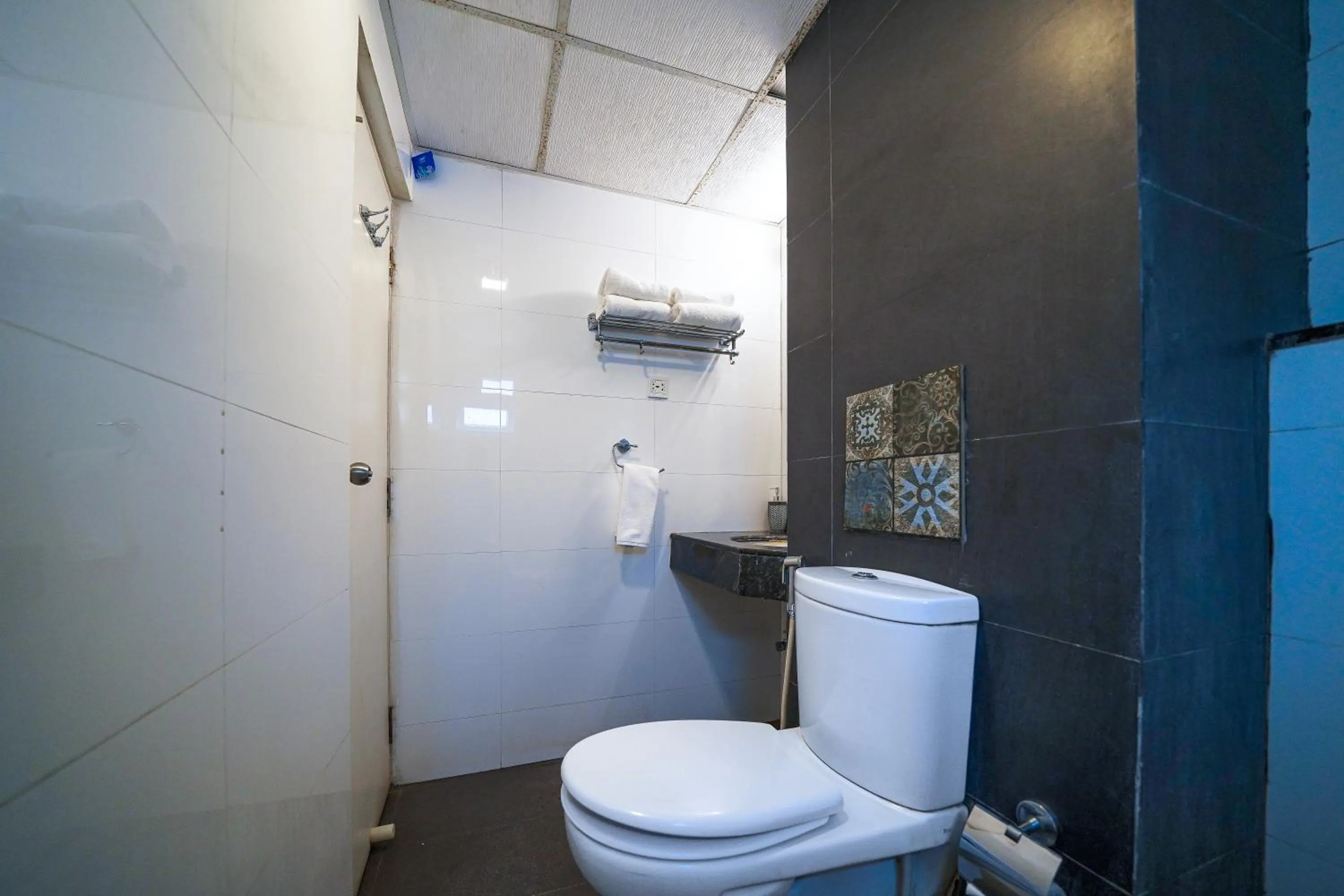Toilet in Olive Hotel Electronic City by Embassy Group