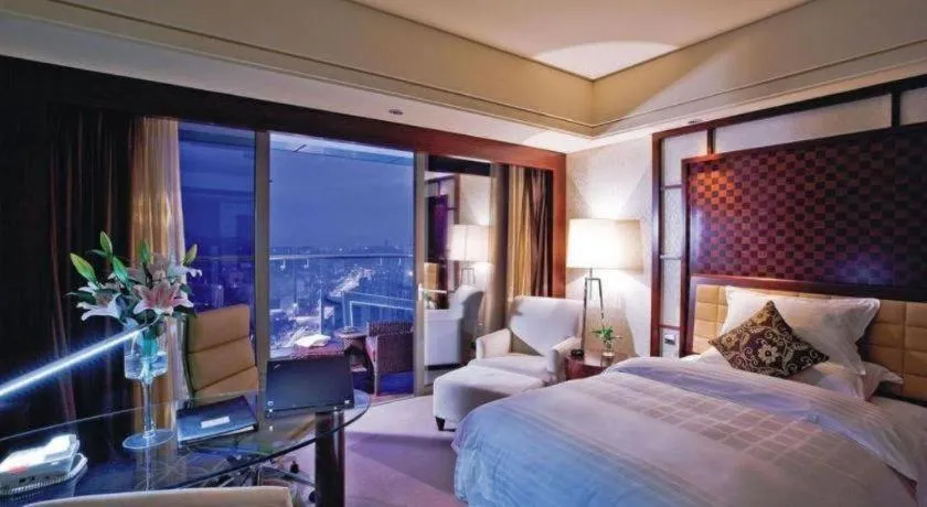 Bed in Shangyu International Hotel