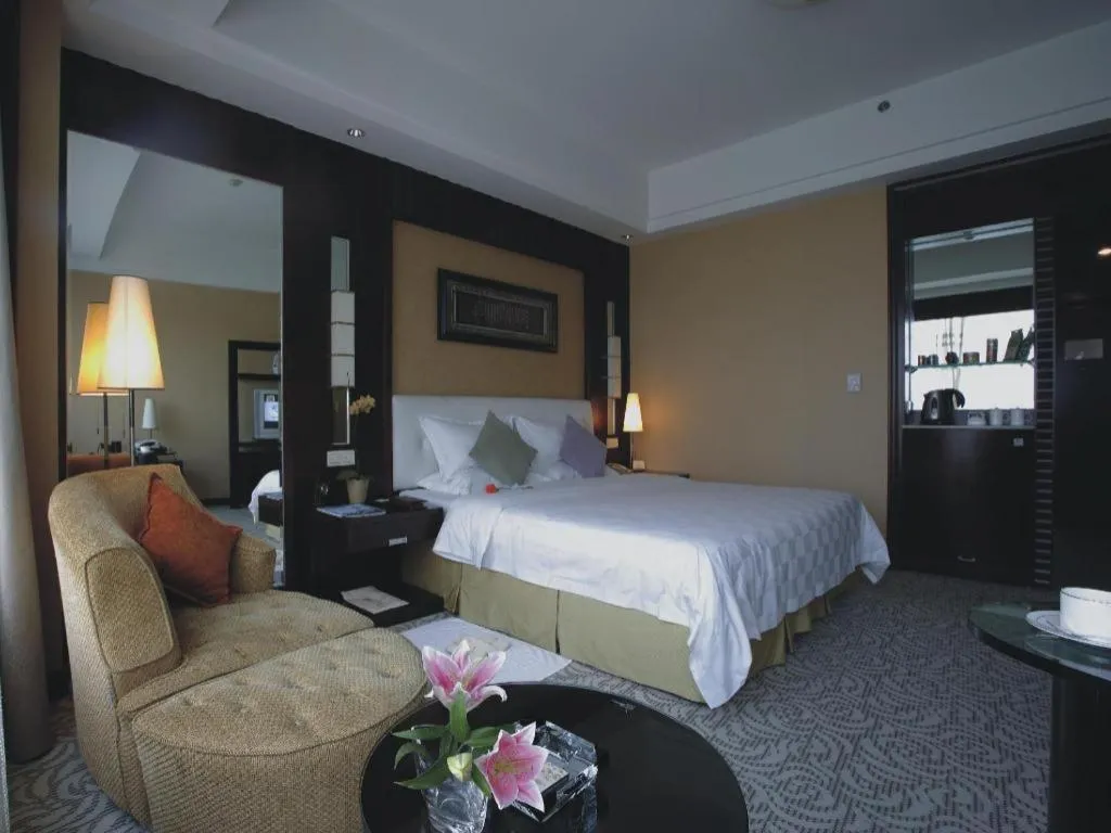 Bed in Shangyu International Hotel