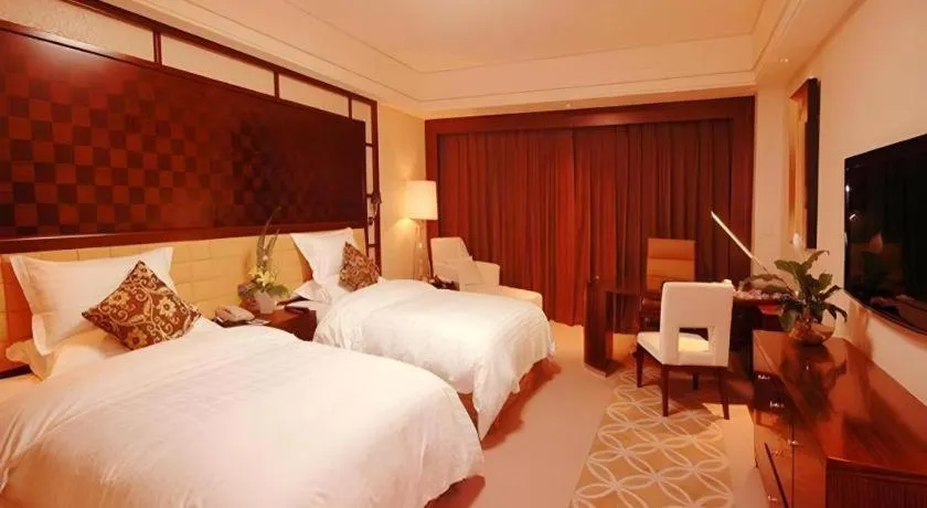 Bed in Shangyu International Hotel