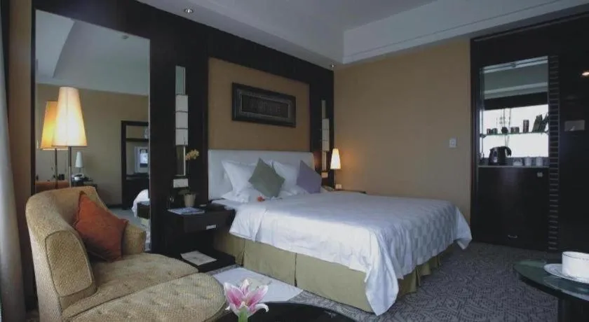 Bed in Shangyu International Hotel