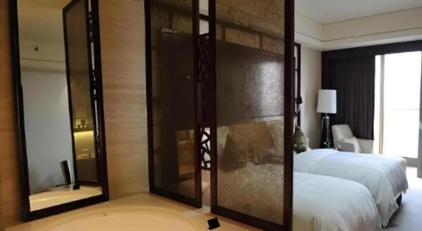 Bed in Shangyu International Hotel