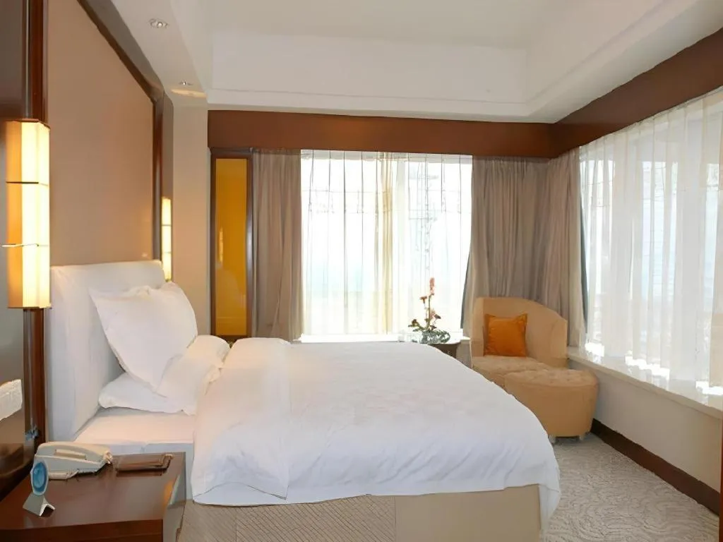 Bed in Shangyu International Hotel