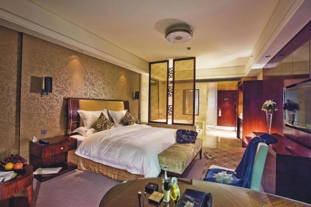 Bed in Shangyu International Hotel