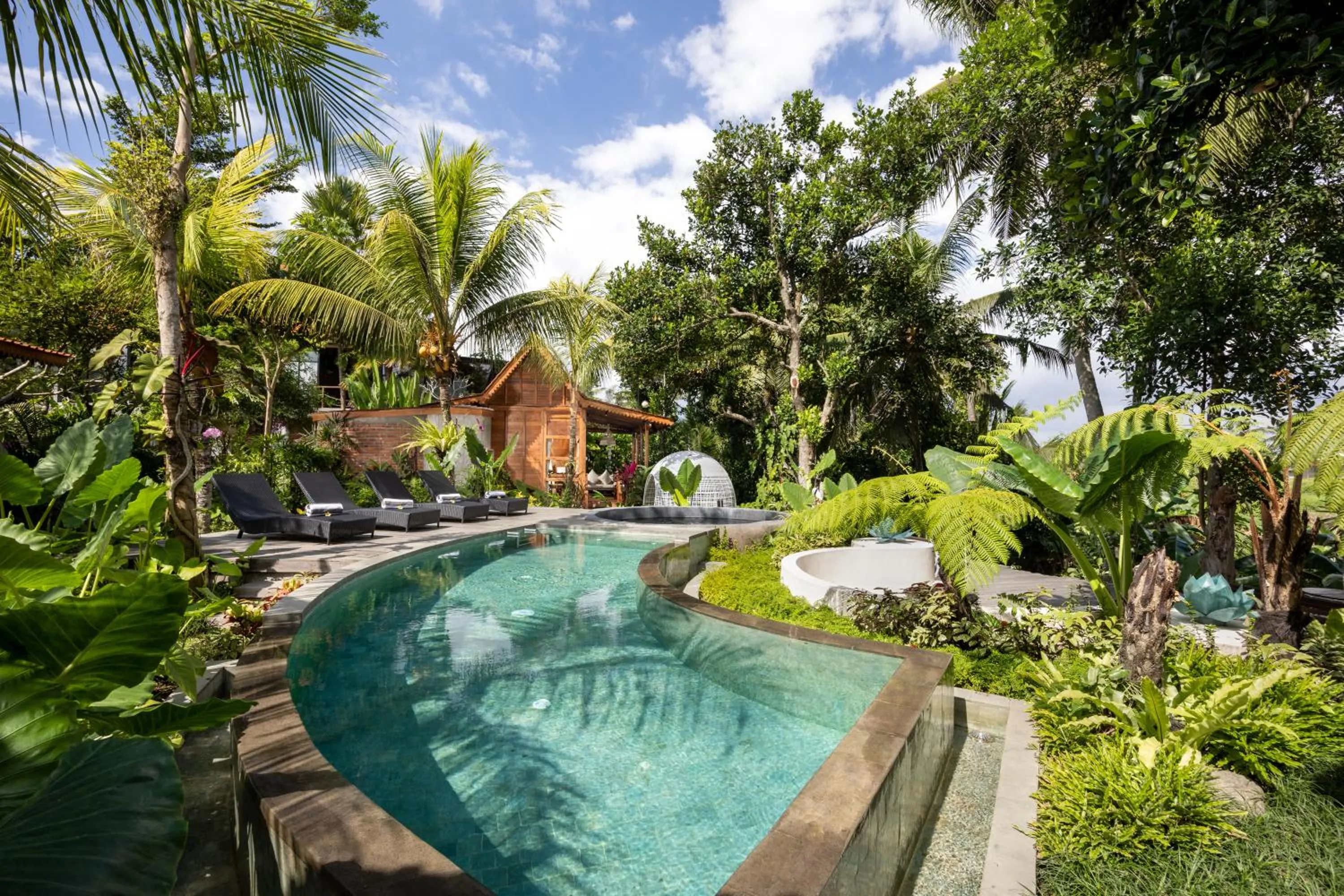 Swimming pool in Berlima Wooden Lodge by GenuineHost