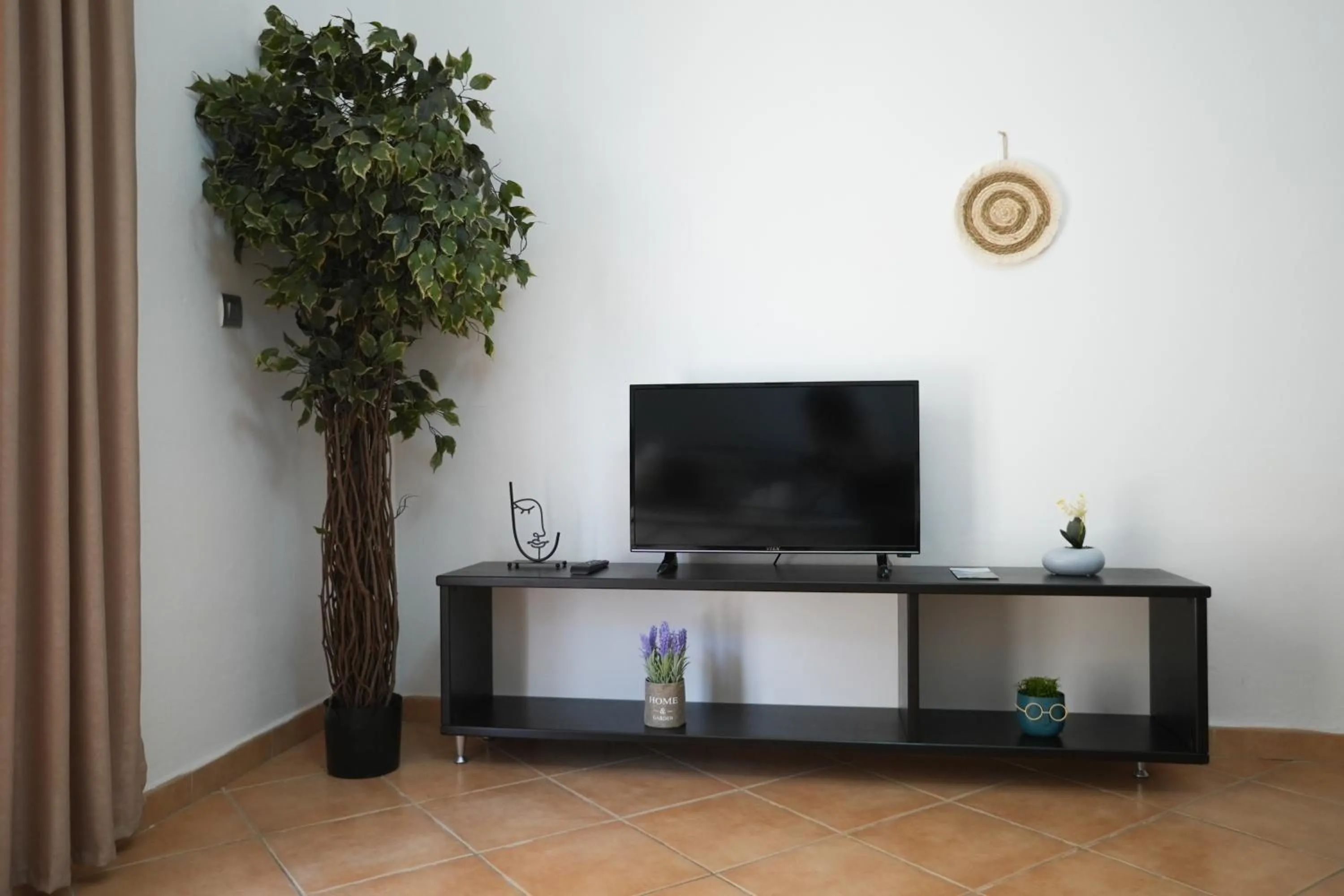 Communal lounge/ TV room in Saranda Waterside Apartments