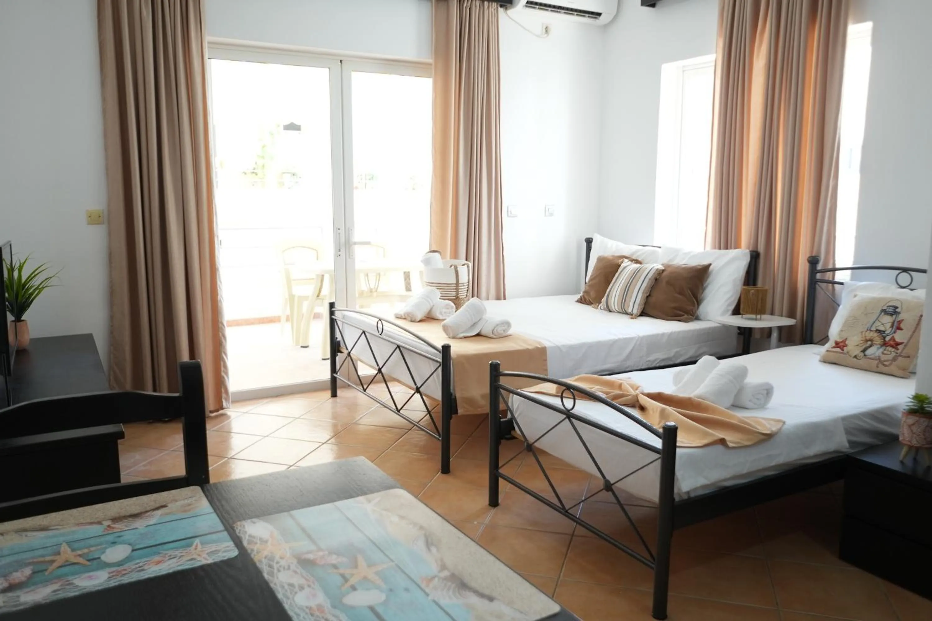 Bed in Saranda Waterside Apartments