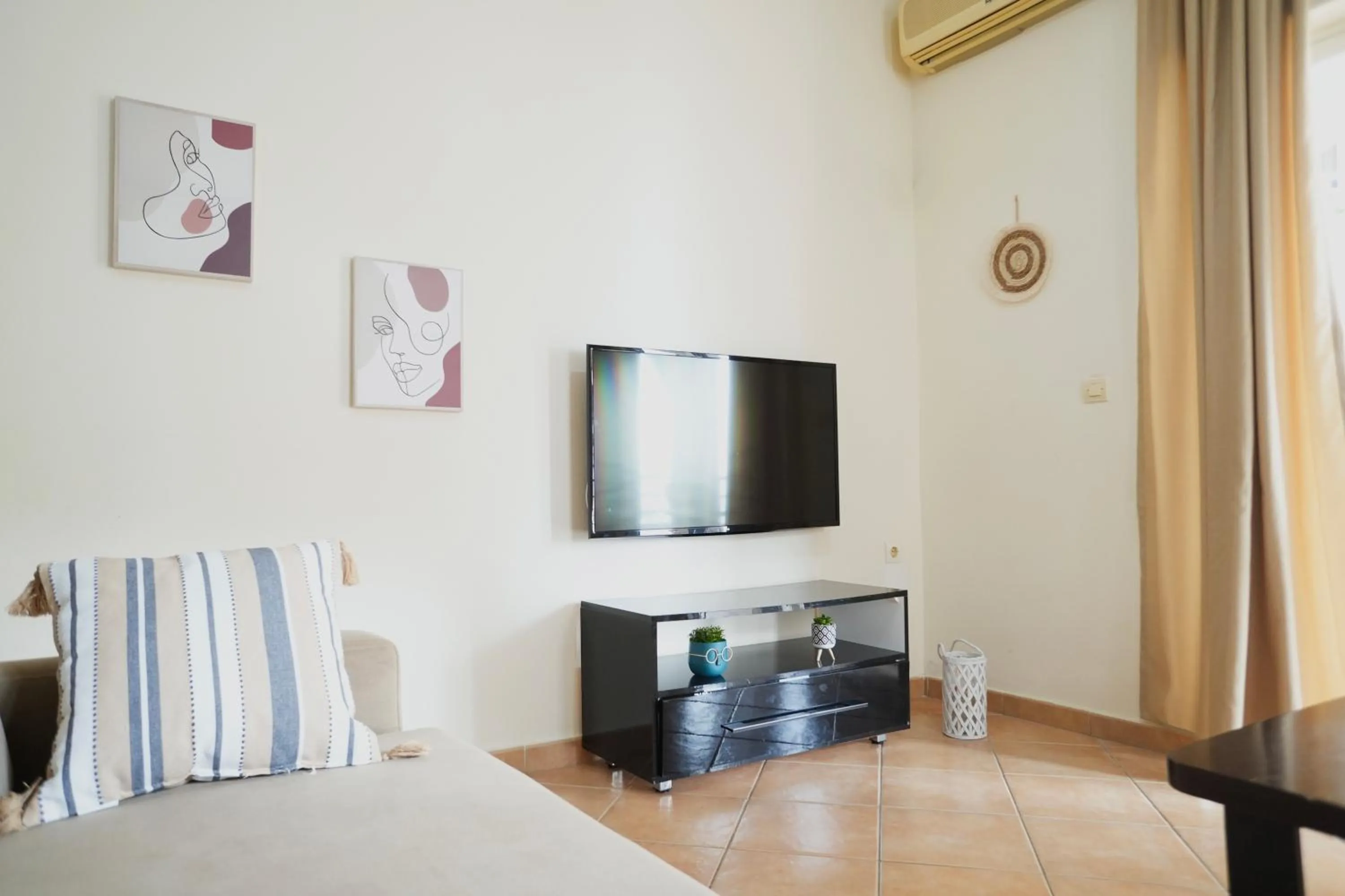 Living room, Bed in Saranda Waterside Apartments