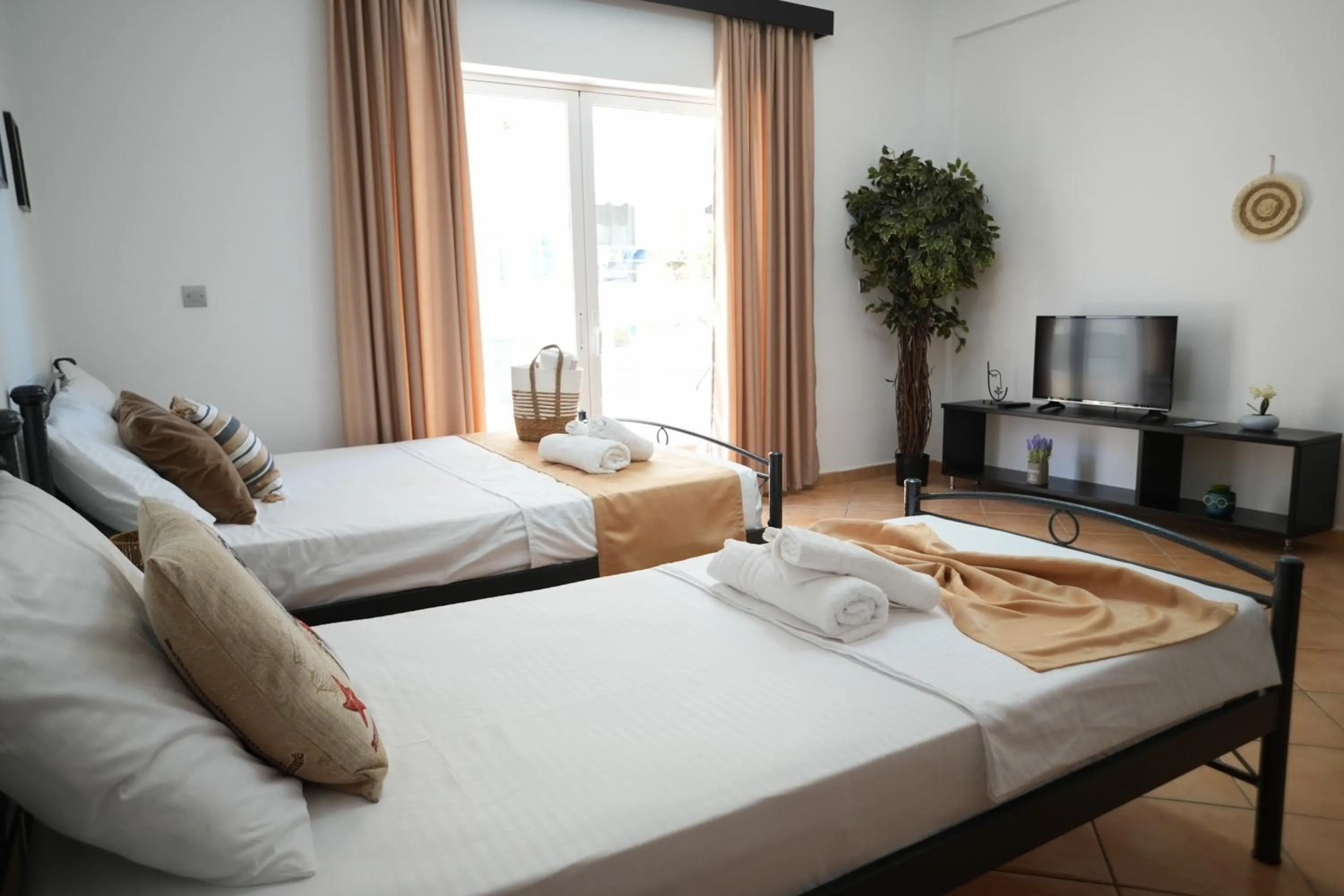 Bed in Saranda Waterside Apartments