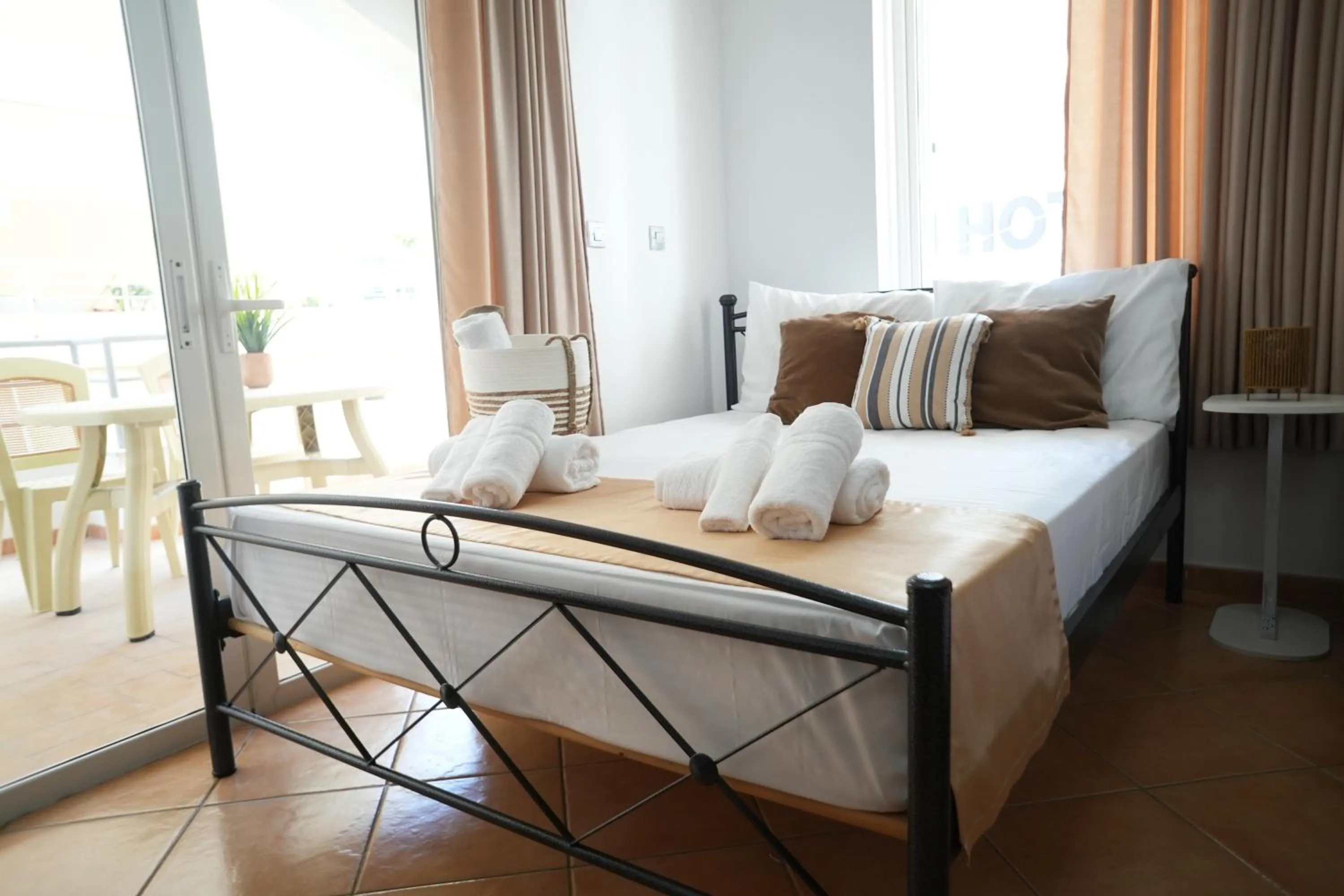 Bed in Saranda Waterside Apartments