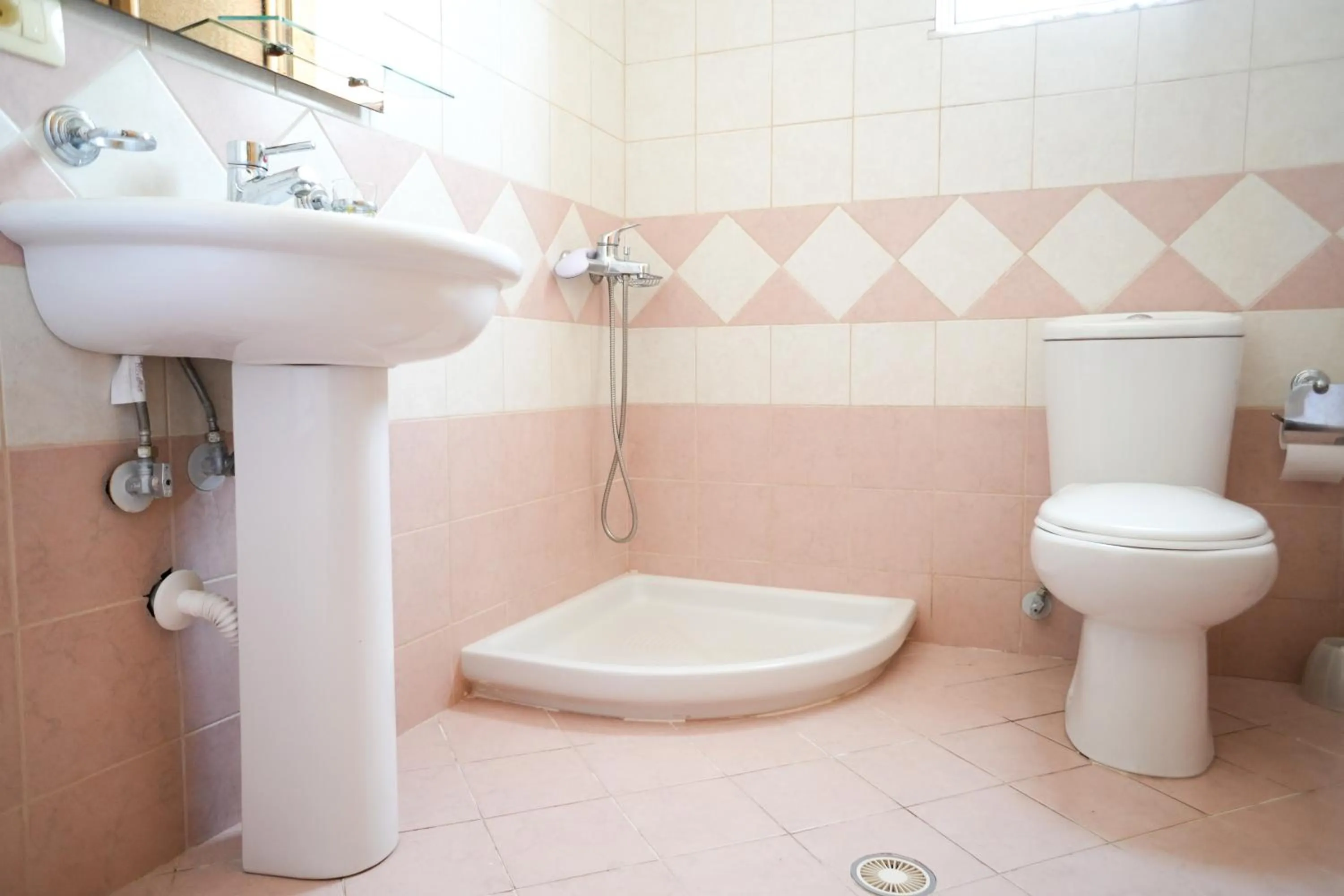 Shower in Saranda Waterside Apartments