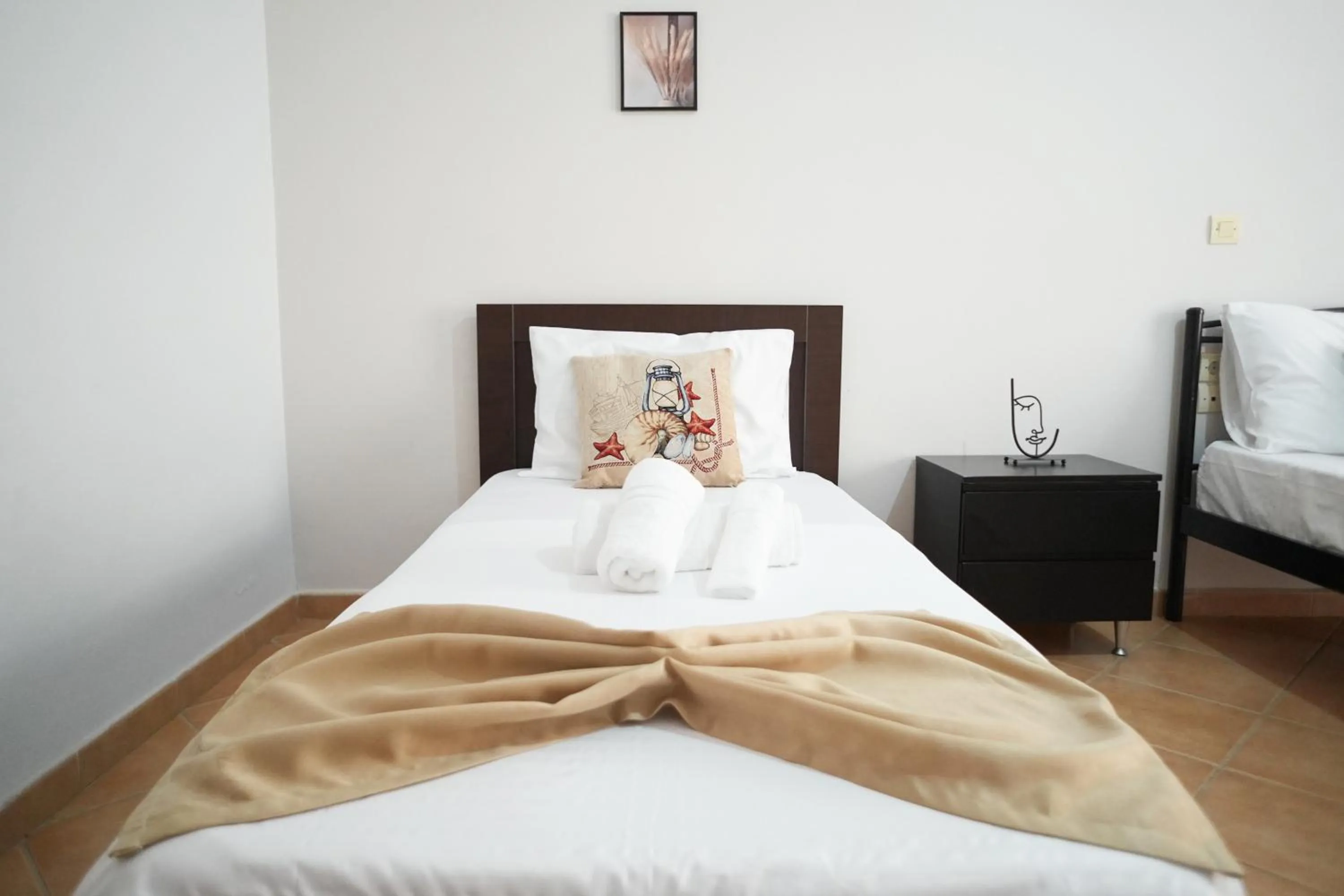 Bed in Saranda Waterside Apartments