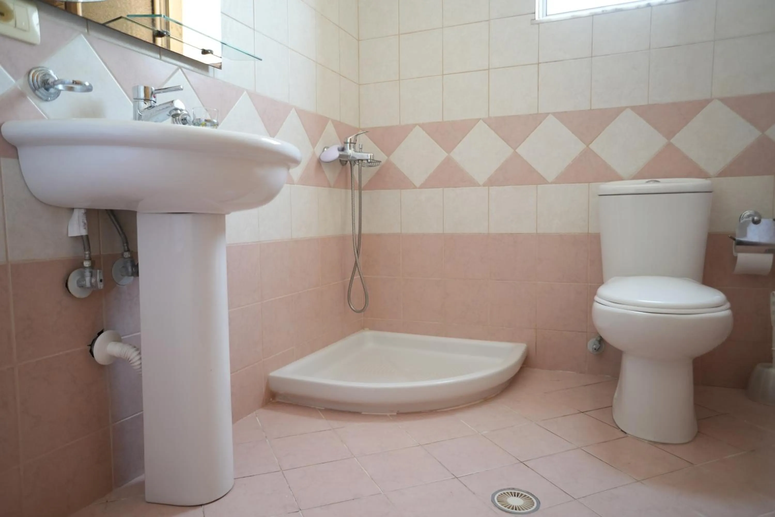 Shower in Saranda Waterside Apartments