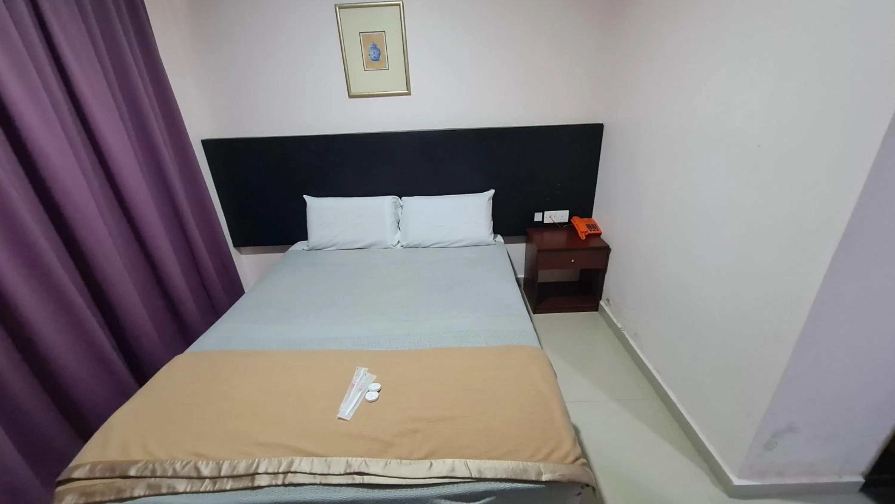 Bed in SP Venture Boutique Hotel