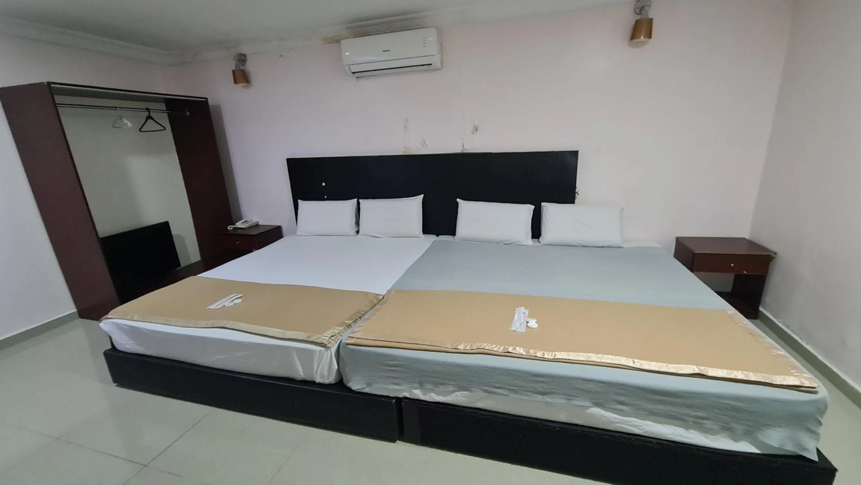 Bed in SP Venture Boutique Hotel