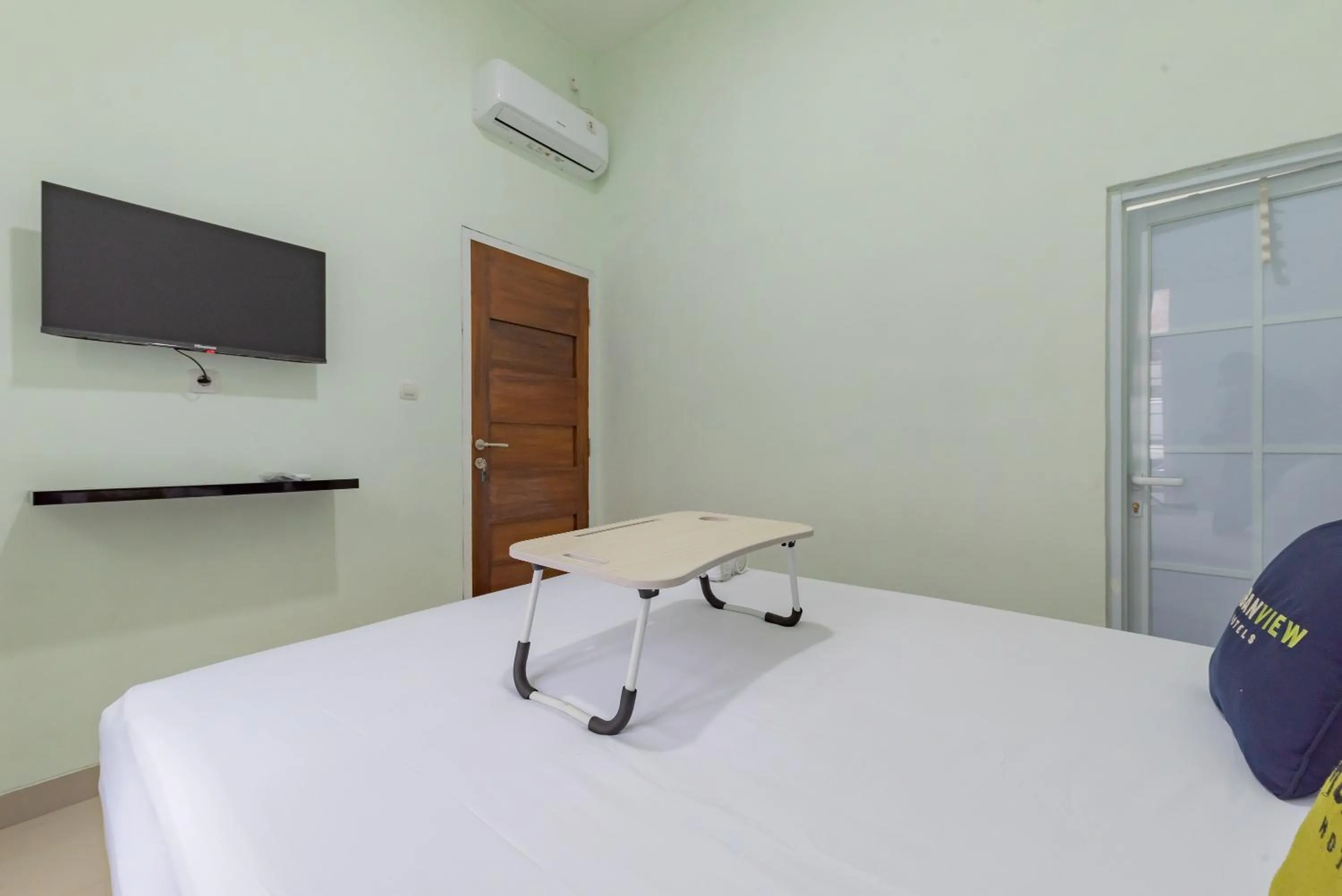 Bed in Urbanview Hotel Nakasya Burangrang