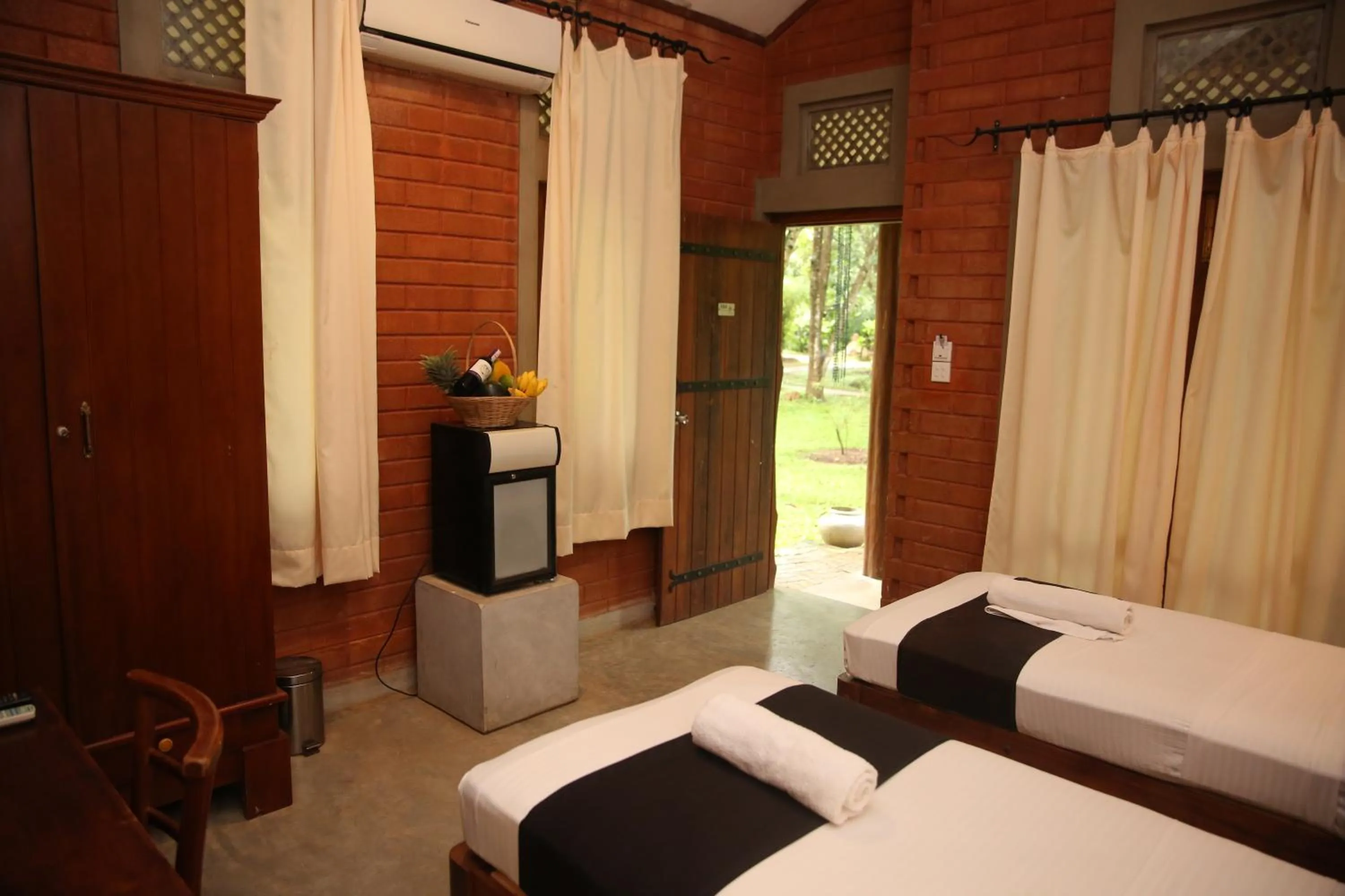 Bed in Nil Diya Mankada Safari Lodge