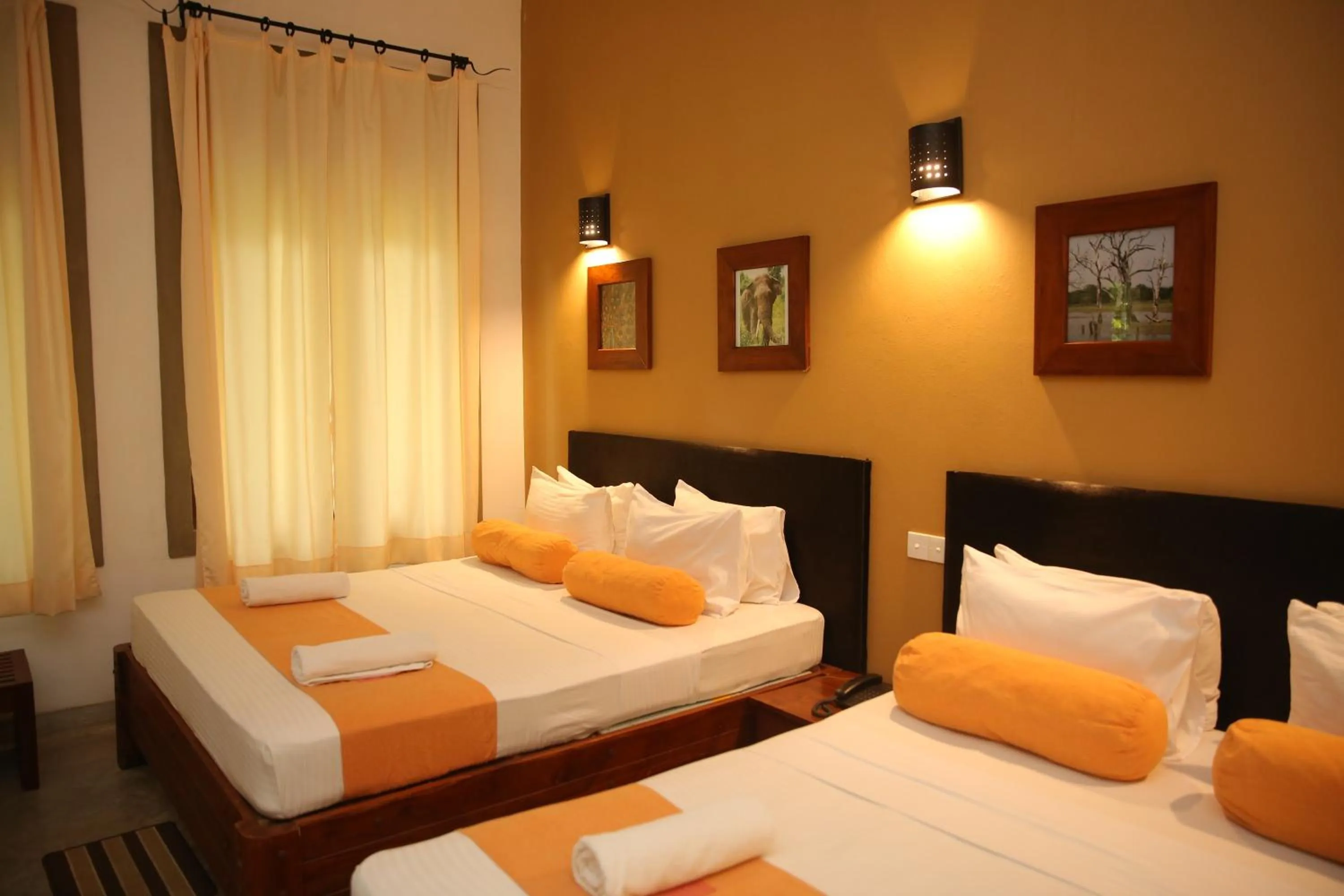 Bed in Nil Diya Mankada Safari Lodge