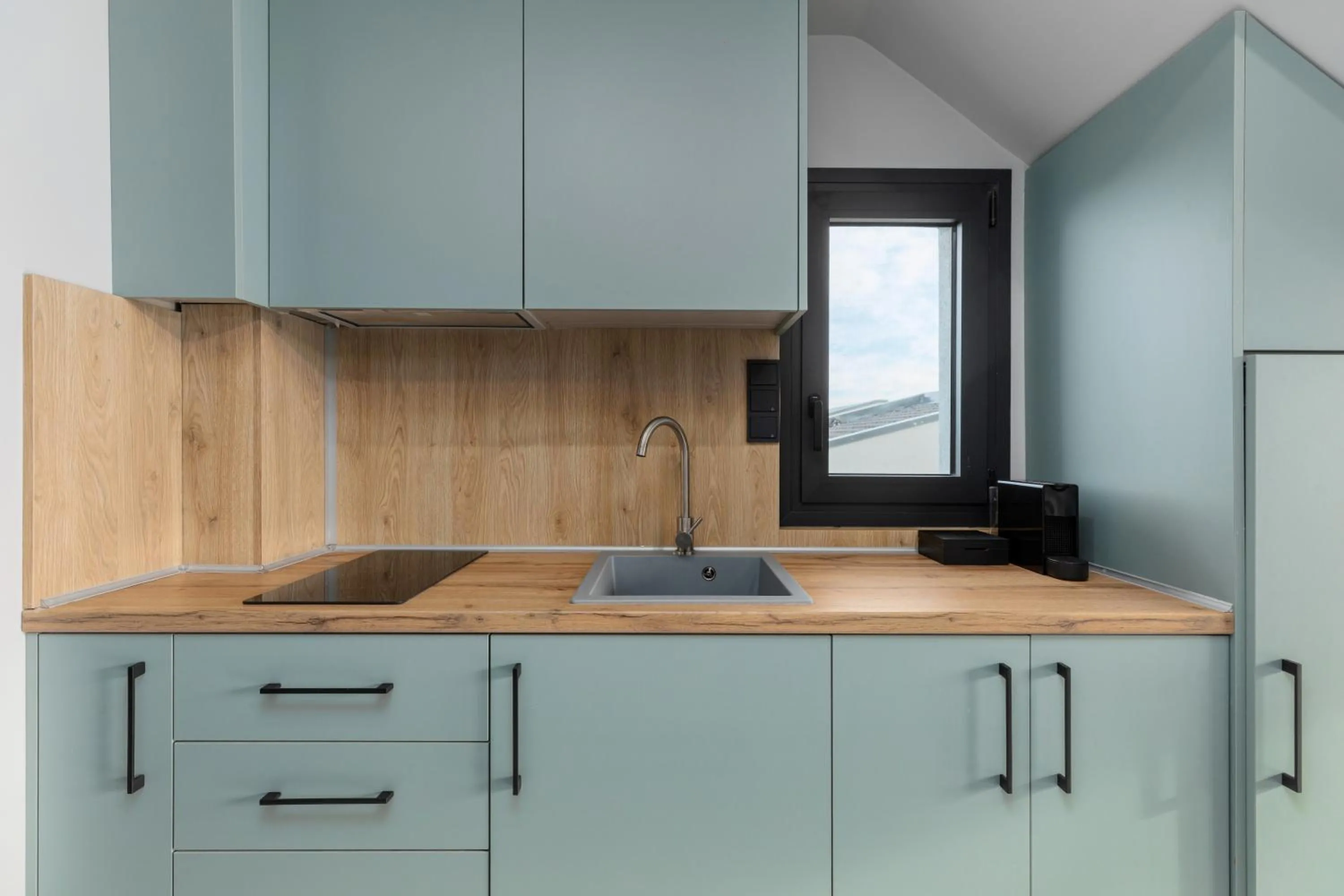 Kitchen or kitchenette in The 8 Suites