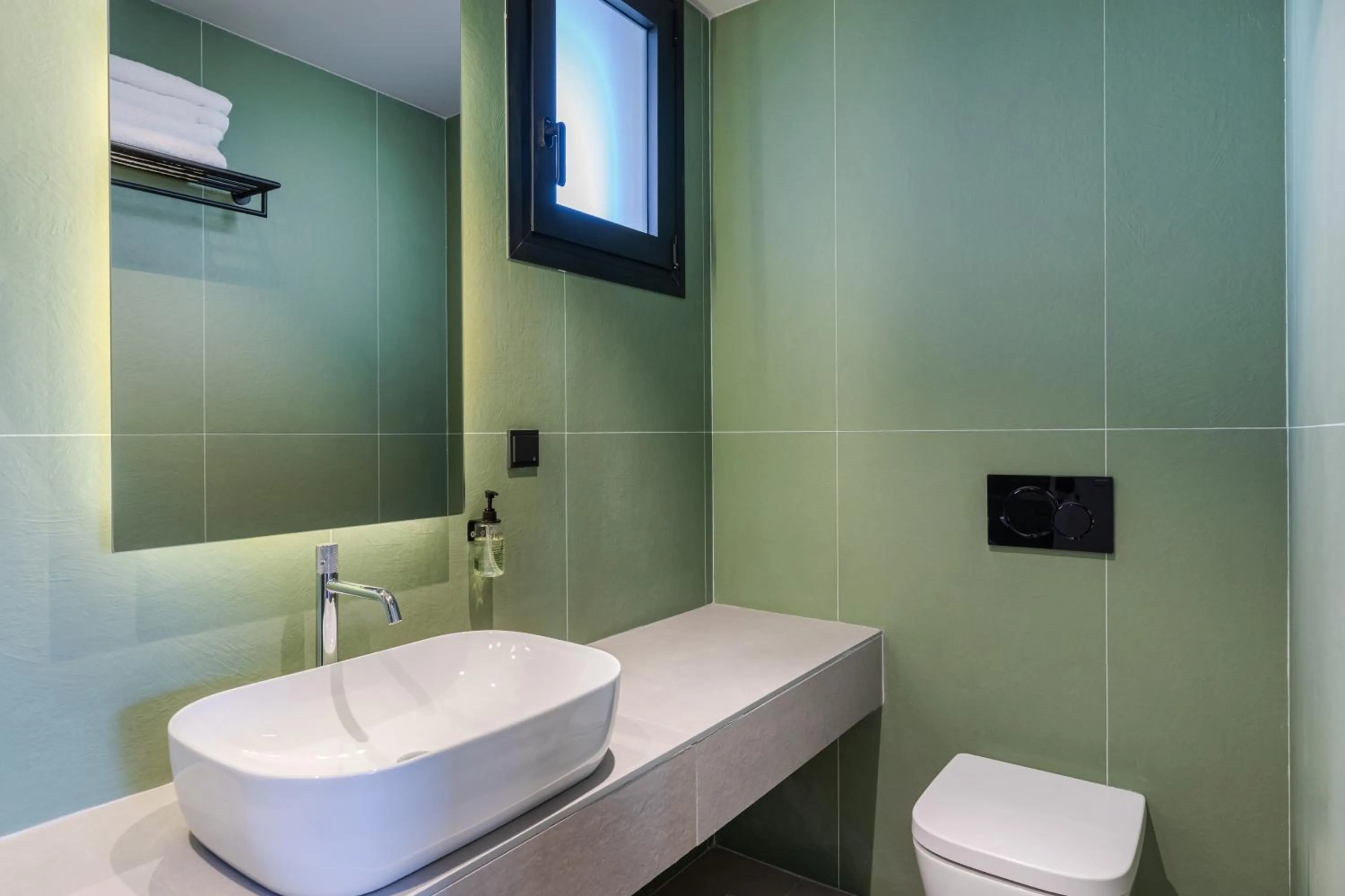 Toilet in The 8 Suites