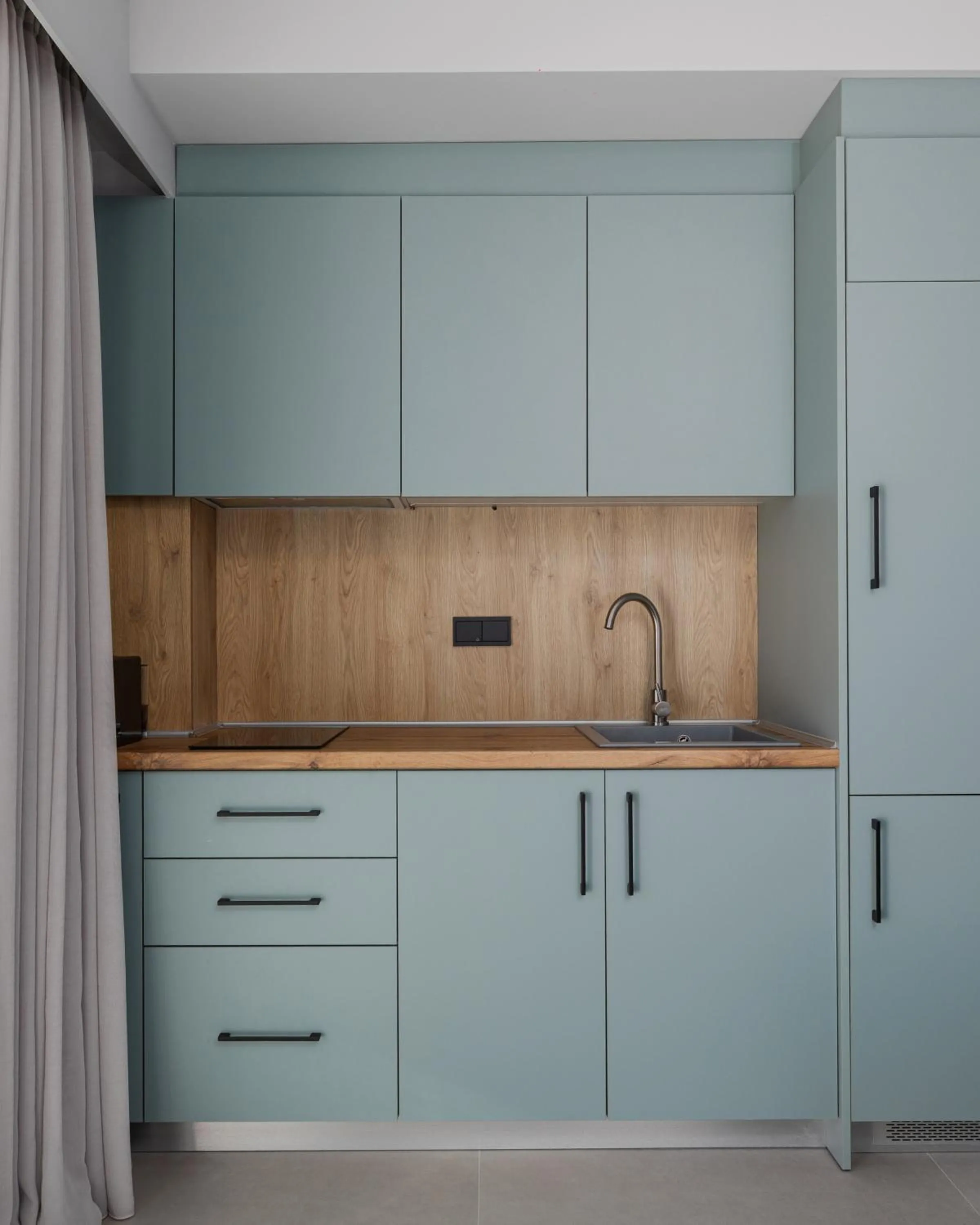 Kitchen or kitchenette in The 8 Suites