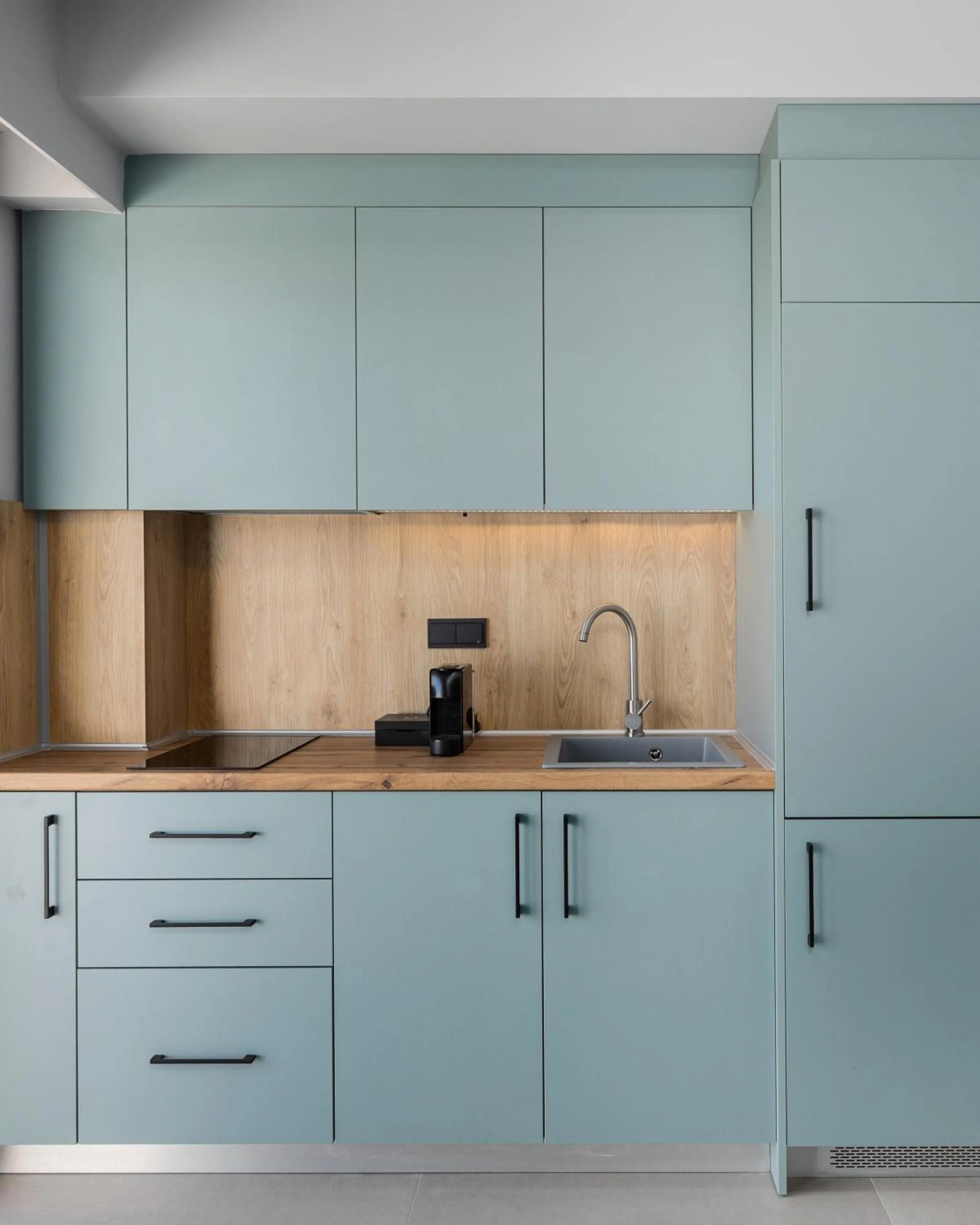 Kitchen or kitchenette in The 8 Suites