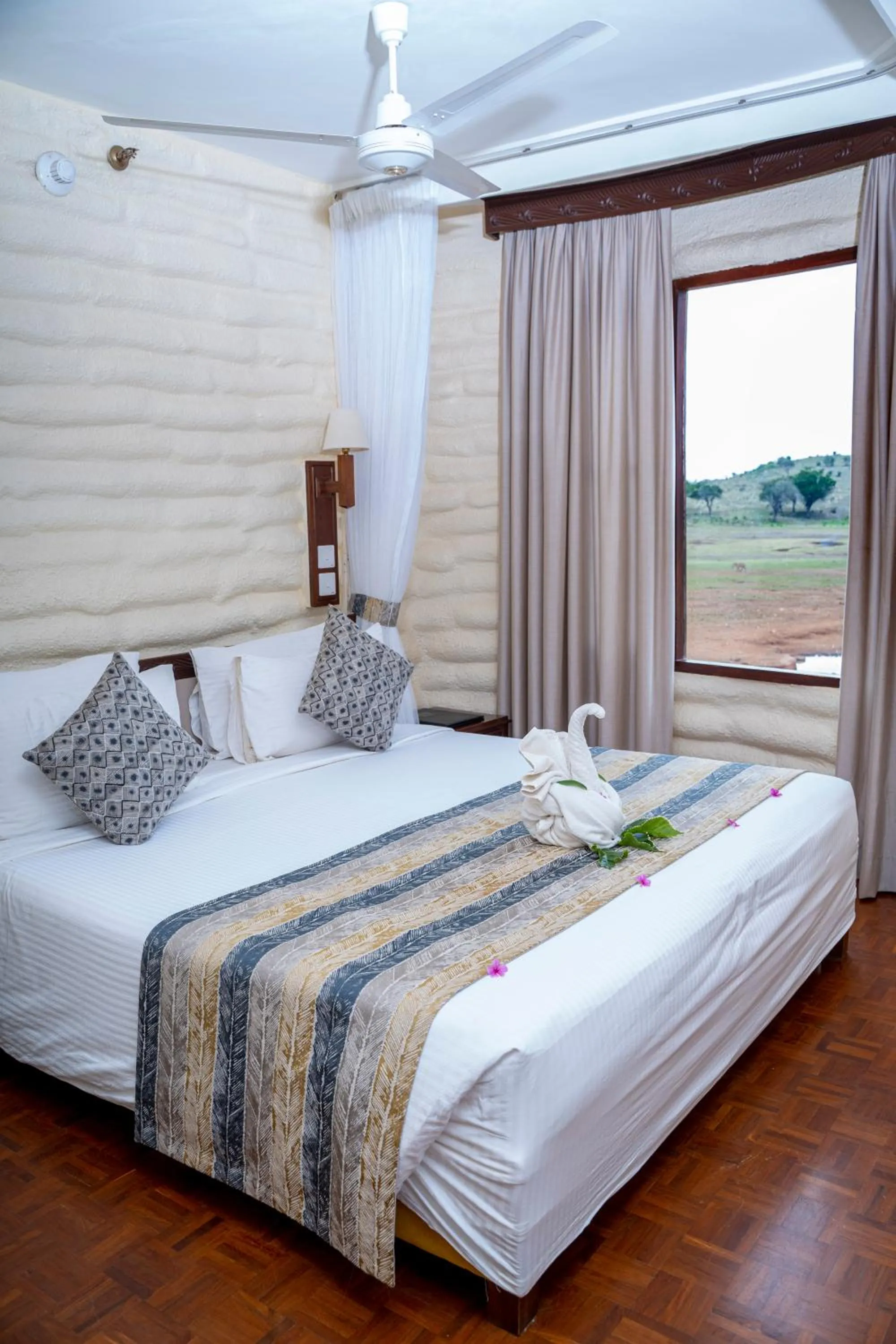 Bed in Salt Lick Safari Lodge