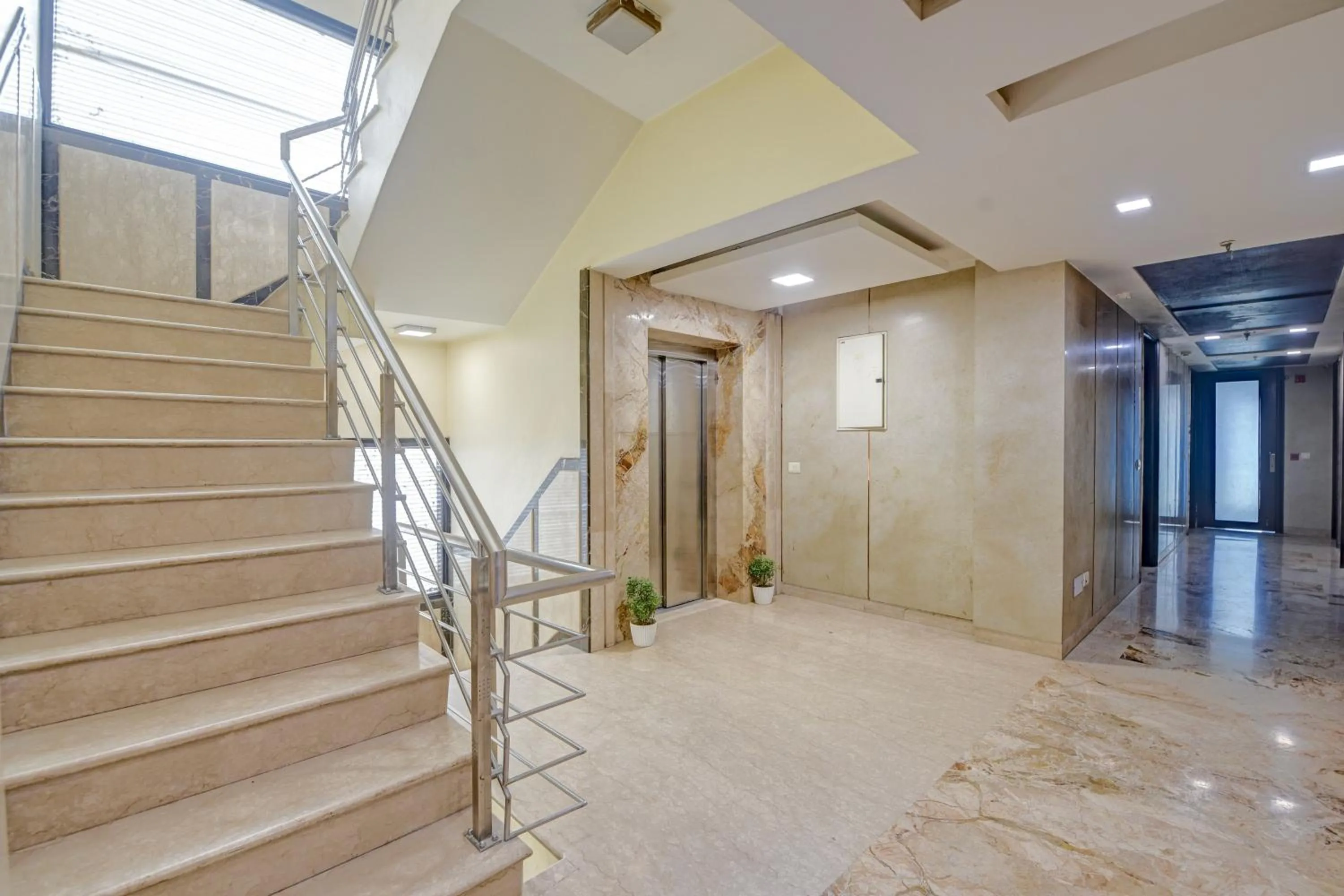 elevator in Qotel Signature Lavish Inn Rajouri Garden