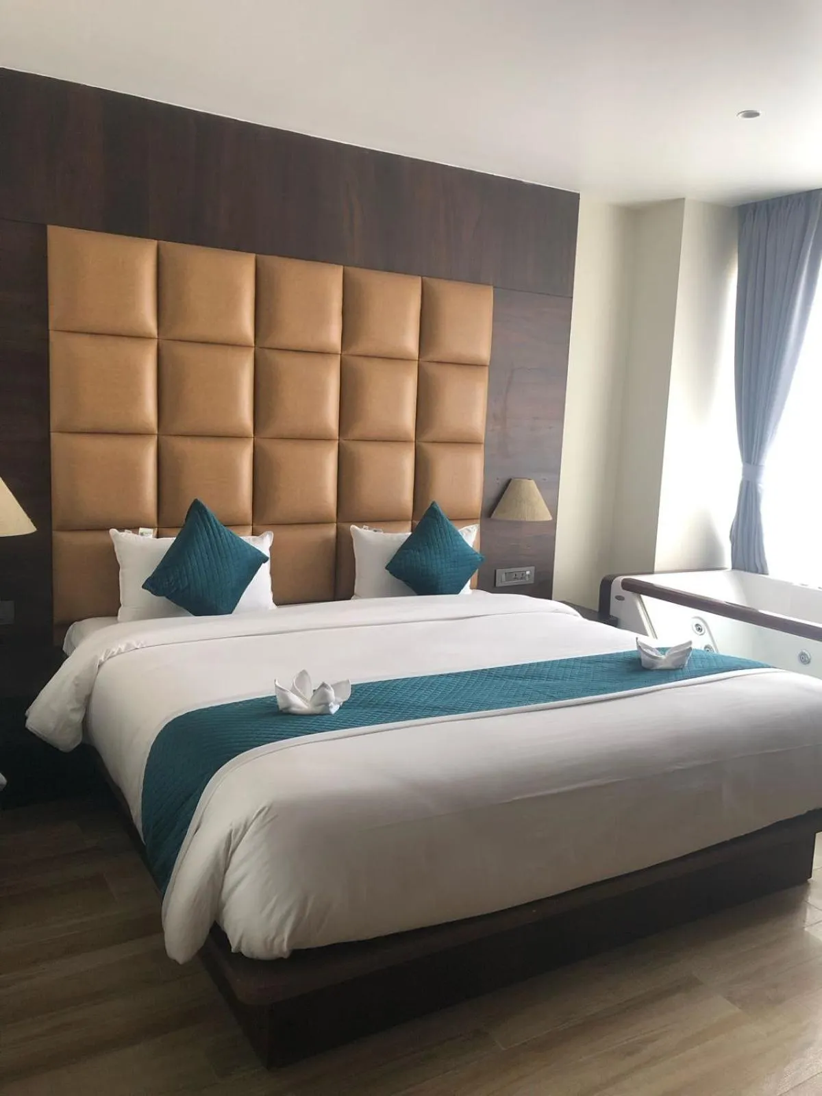 Bed in Dees Boutique Hotel