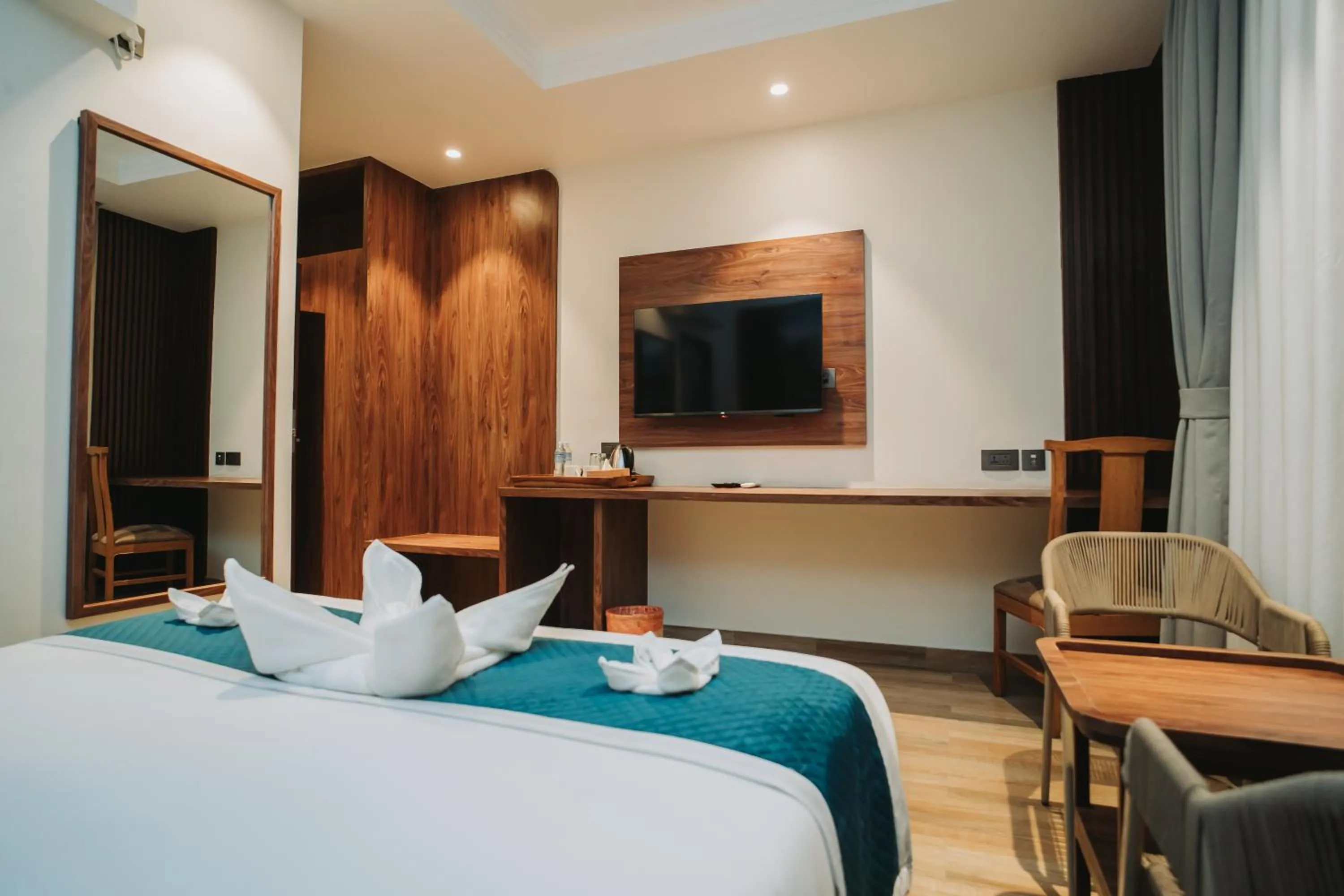 Bed in Dees Boutique Hotel