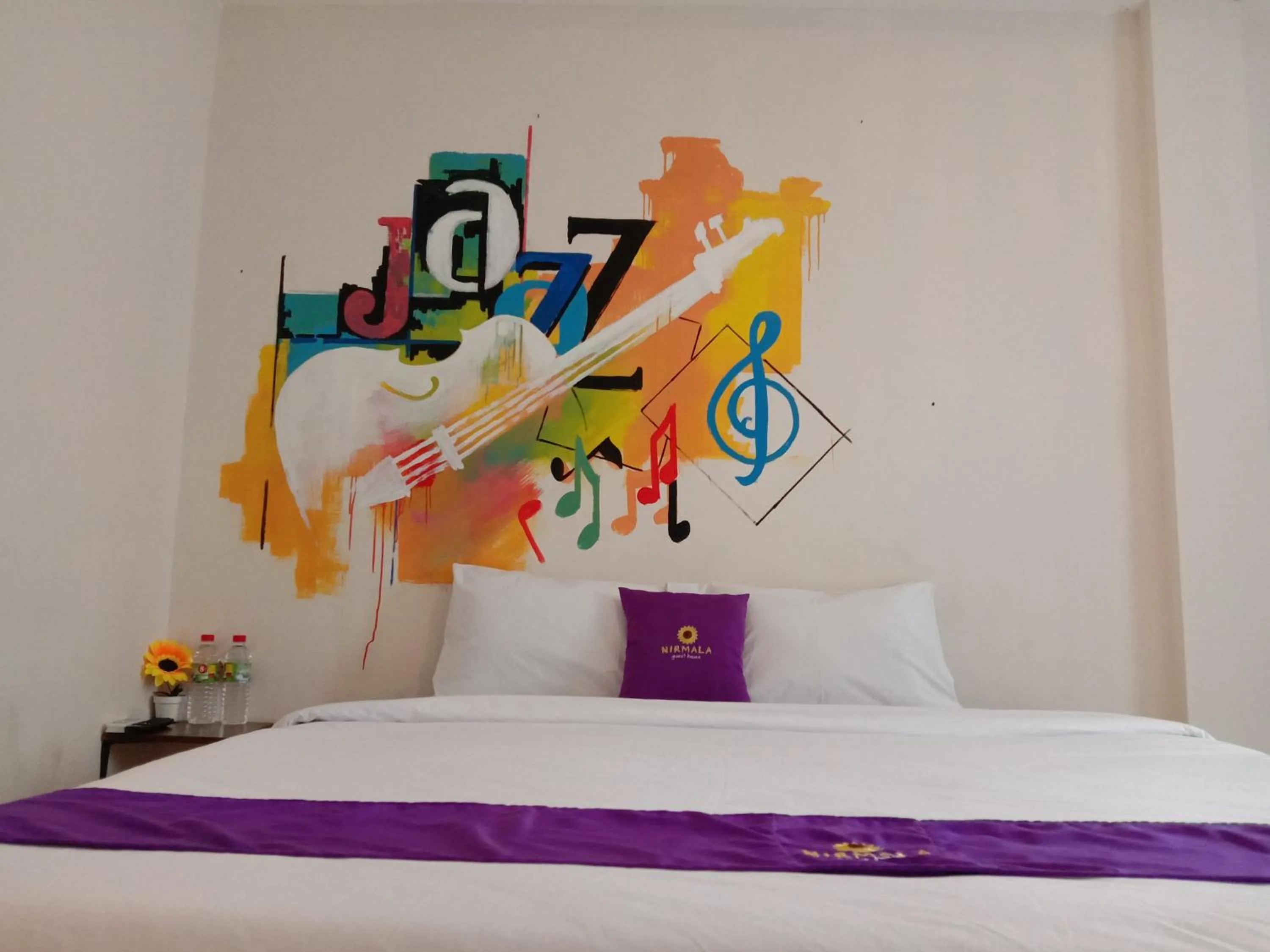 Bed in Votel Nirmala Hotel Malang