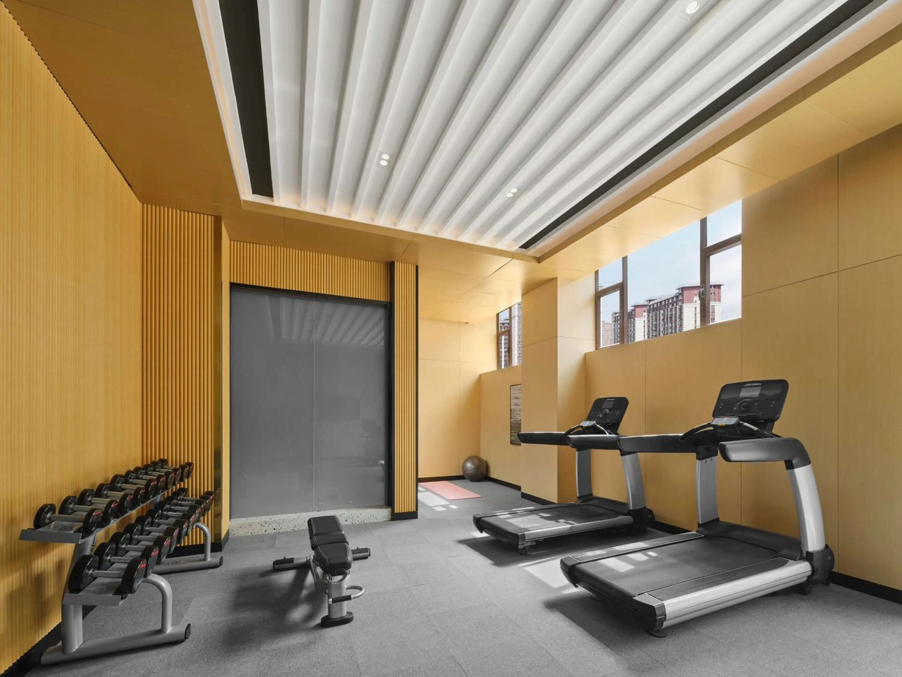 Fitness centre/facilities in Hilton Garden Inn Aksu Downtown